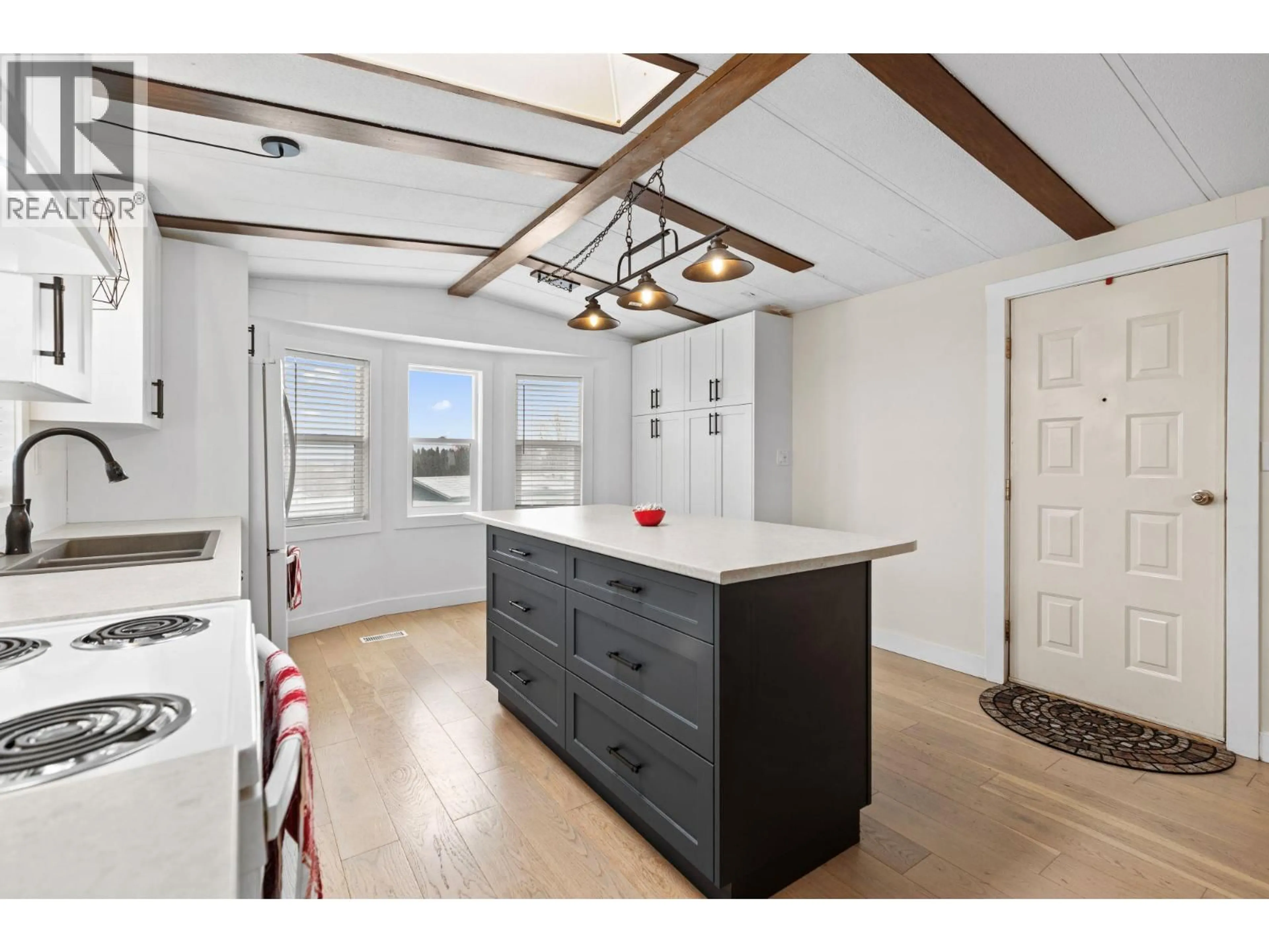 Open concept kitchen, wood/laminate floor for B7 - 7155 DALLAS DRIVE, Kamloops British Columbia V2C4T1