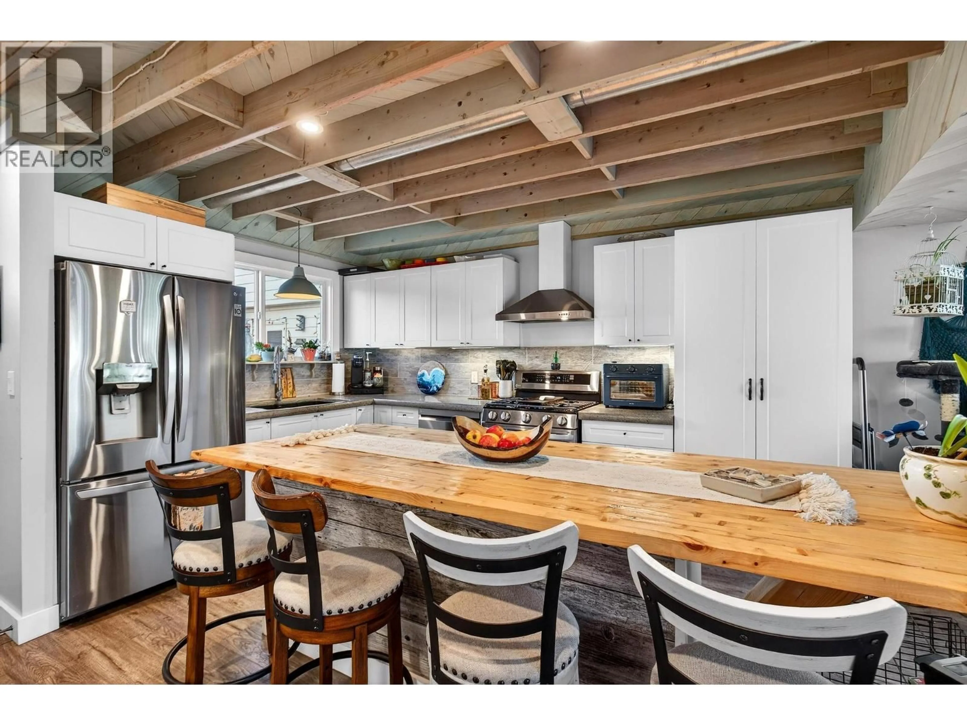 Open concept kitchen, wood/laminate floor for 4 - 170 DAVIE ROAD, Kelowna British Columbia V1X3Y7