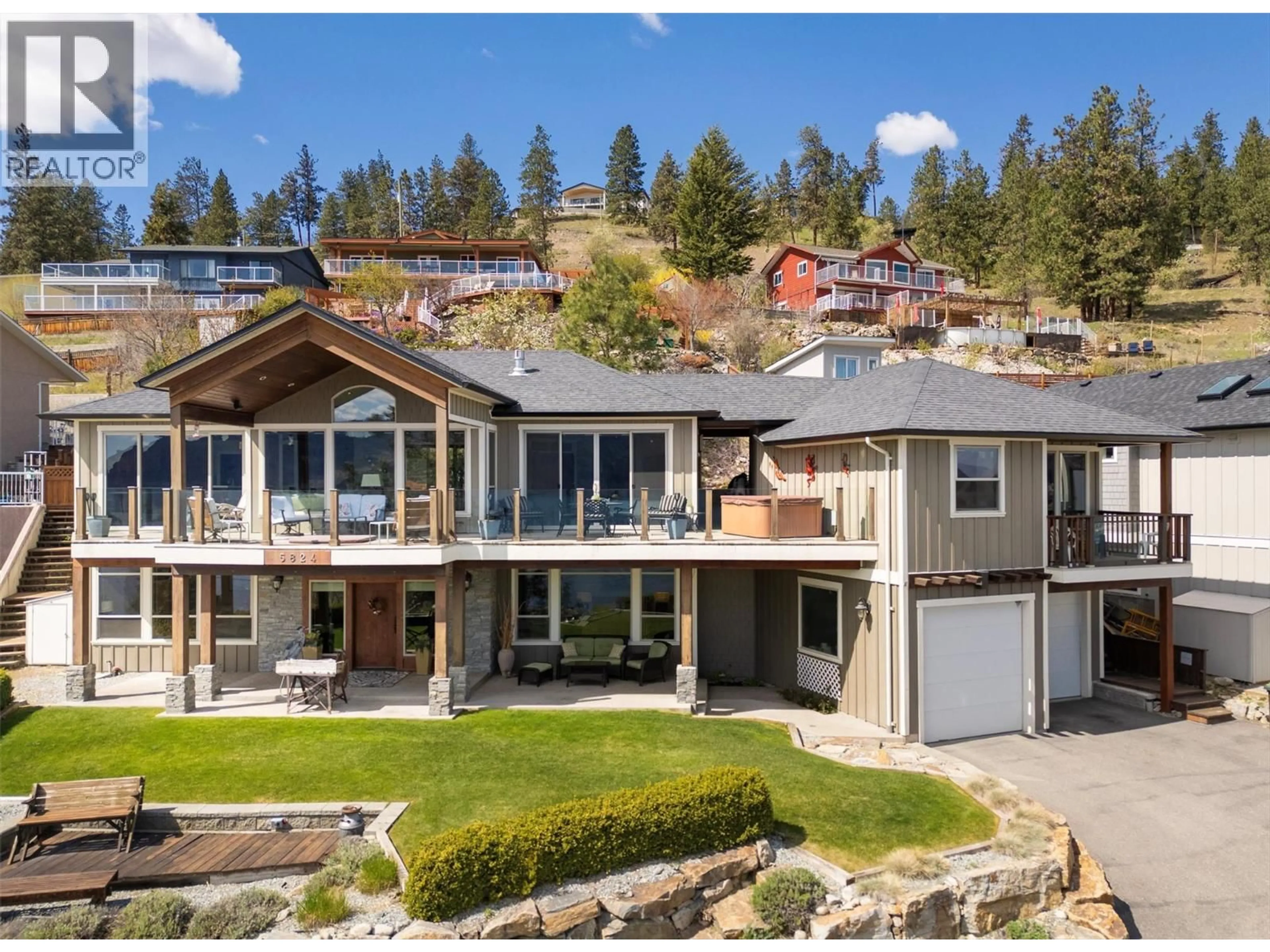A pic from outside/outdoor area/front of a property/back of a property/a pic from drone, mountain view for 5824 COLUMBIA AVENUE, Peachland British Columbia V0H1X4
