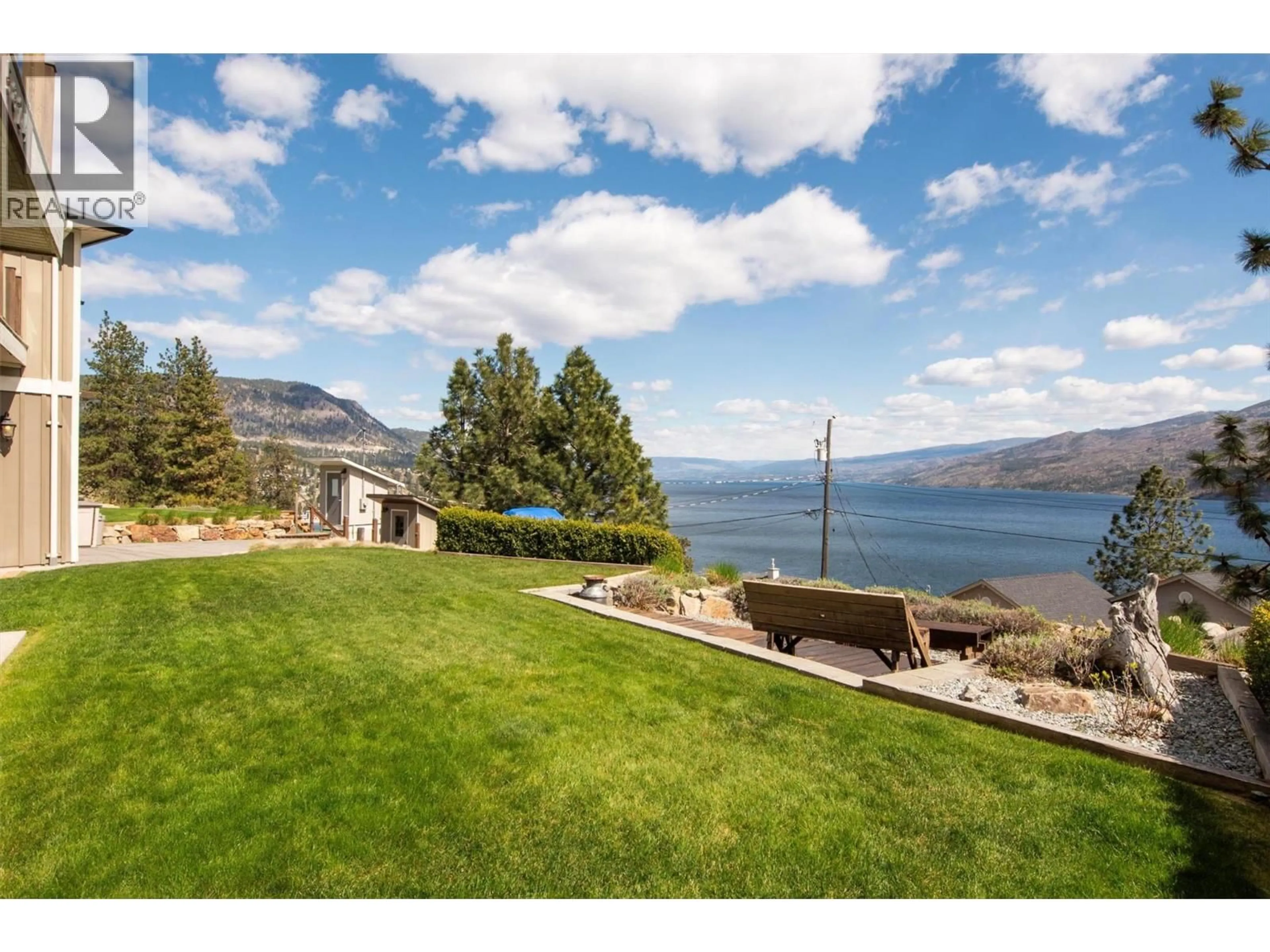 A pic from outside/outdoor area/front of a property/back of a property/a pic from drone, water/lake/river/ocean view for 5824 COLUMBIA AVENUE, Peachland British Columbia V0H1X4