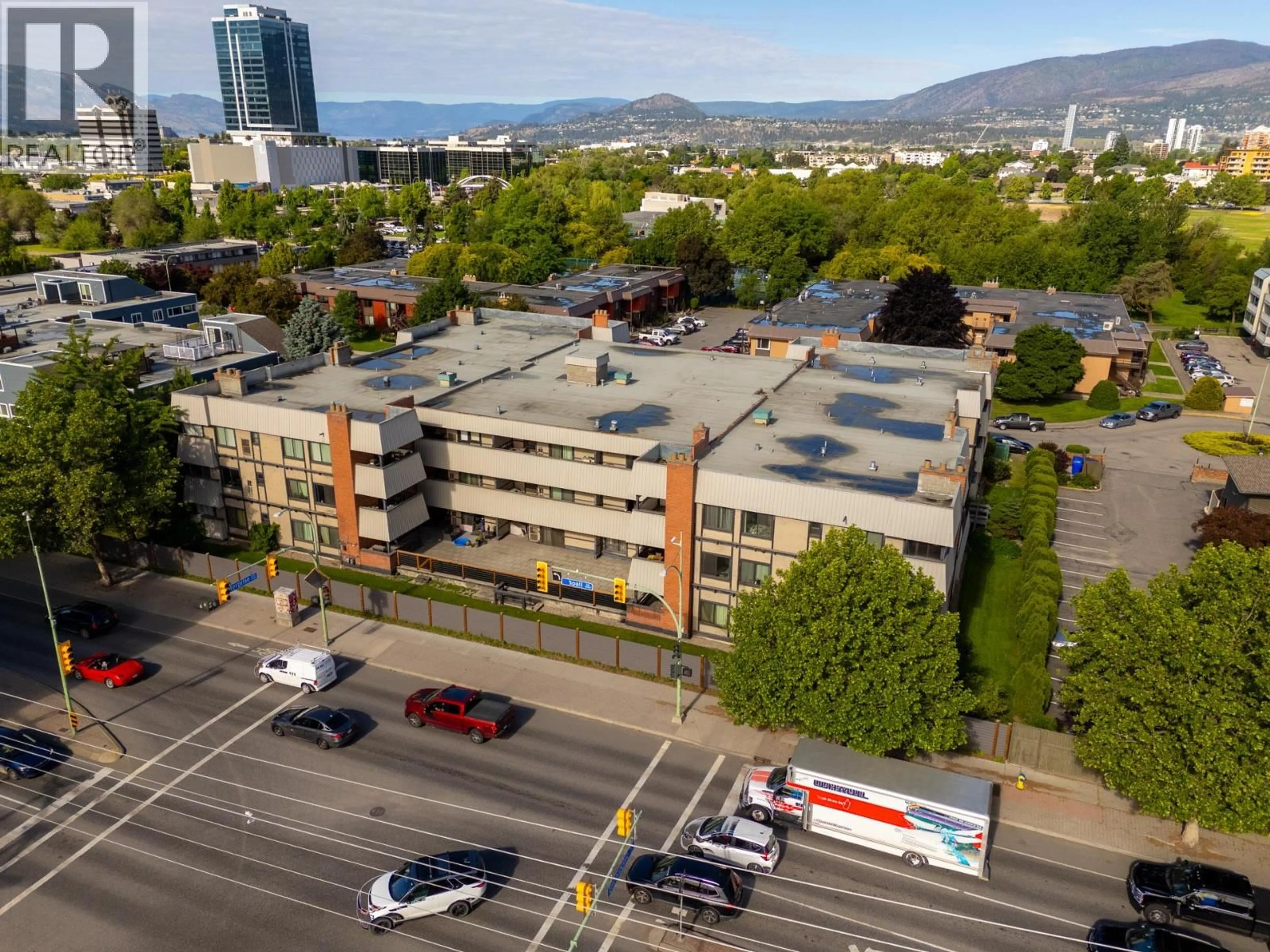A pic from outside/outdoor area/front of a property/back of a property/a pic from drone, city buildings view from balcony for 218 - 1665 UFTON COURT, Kelowna British Columbia V1Y8G7