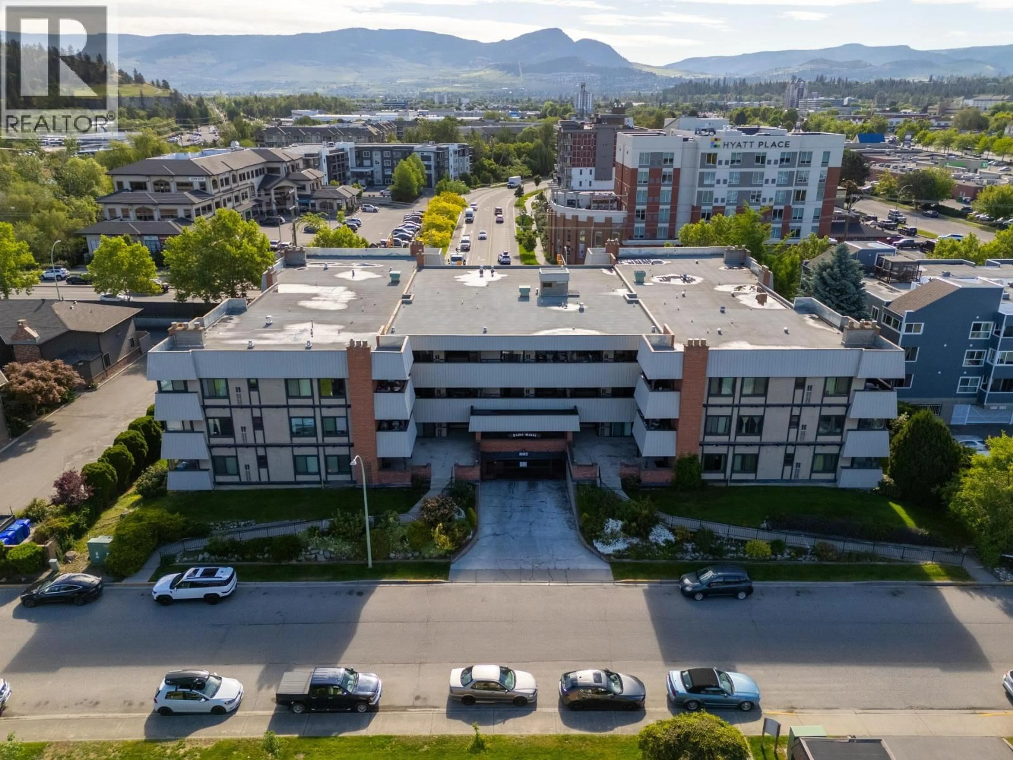 A pic from outside/outdoor area/front of a property/back of a property/a pic from drone, mountain view for 218 - 1665 UFTON COURT, Kelowna British Columbia V1Y8G7