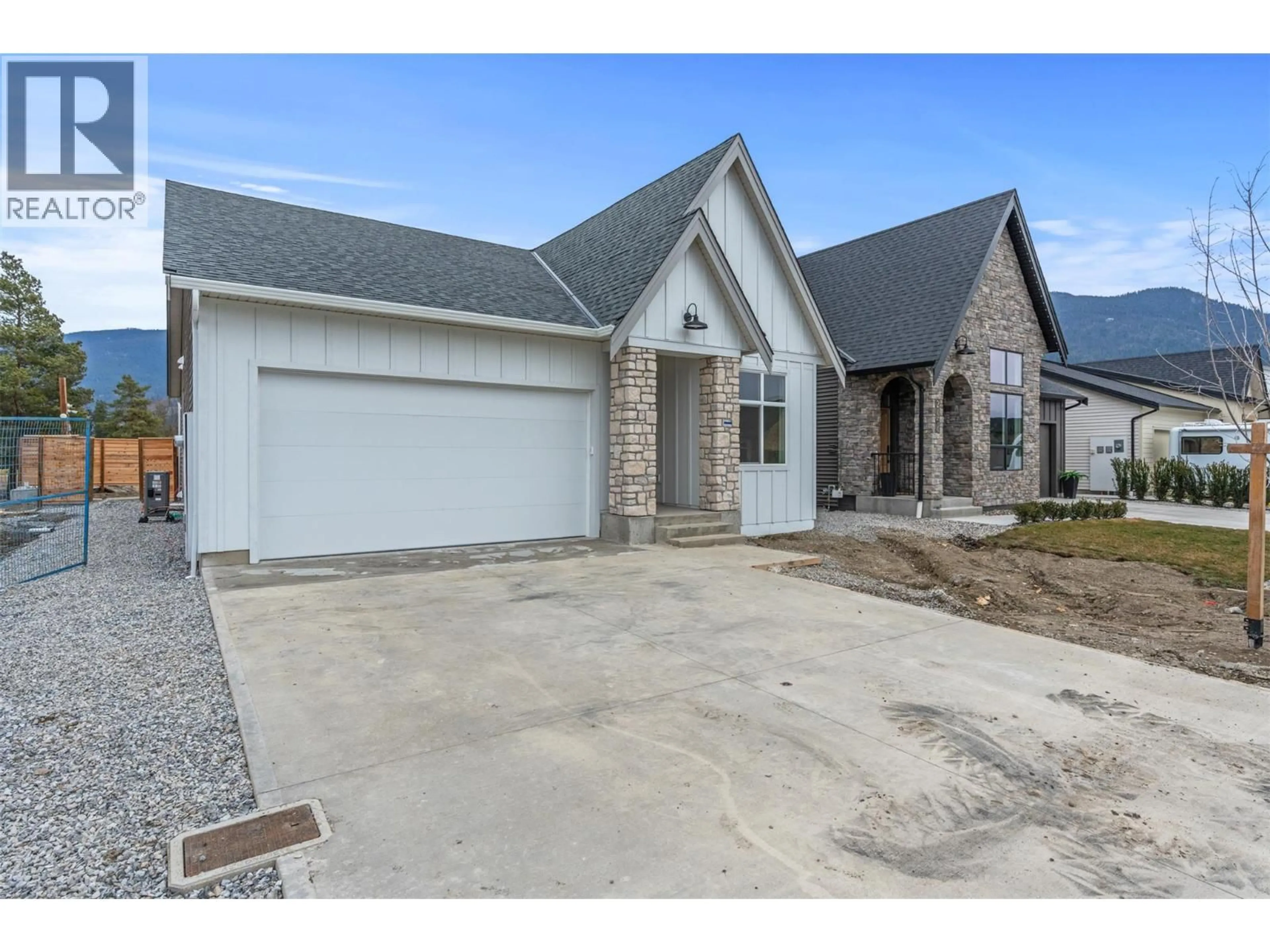 Home with brick exterior material, street for 2468 BRADLEY DRIVE, Armstrong British Columbia V4Y0Y4