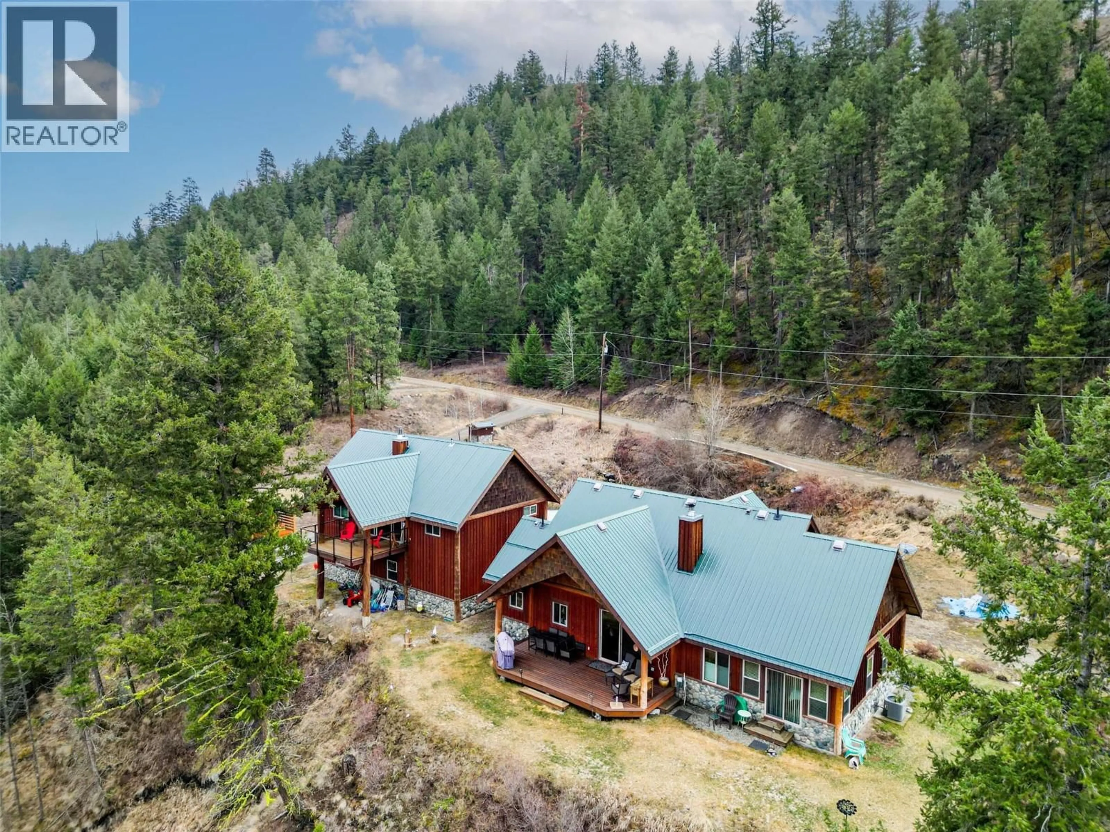 A pic from outside/outdoor area/front of a property/back of a property/a pic from drone, forest/trees view for 8 - 590 EAST SIMILKAMEEN ROAD, Princeton British Columbia V0X1W0