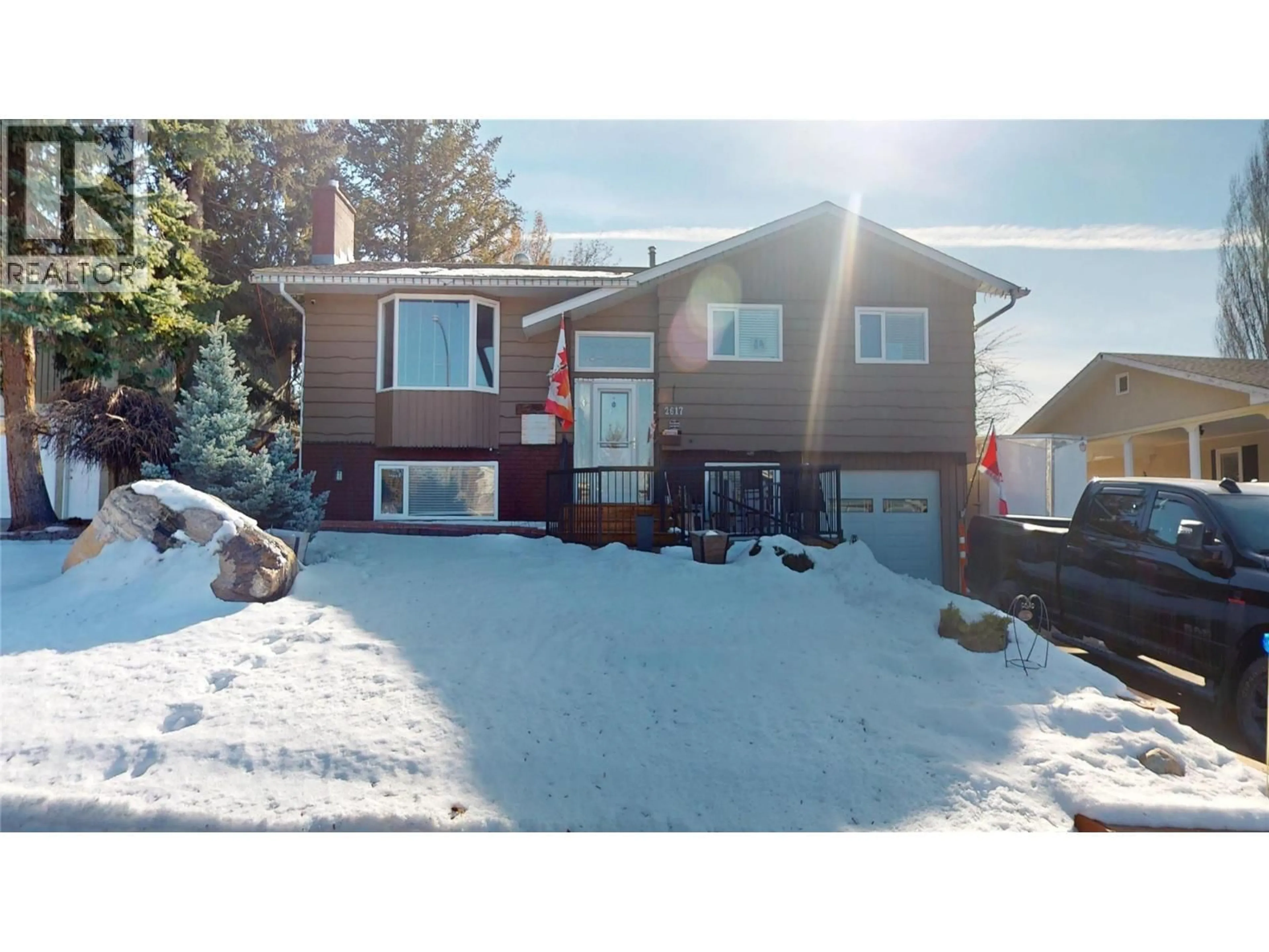 A pic from outside/outdoor area/front of a property/back of a property/a pic from drone, street for 2617 5TH STREET SOUTH, Cranbrook British Columbia V1C4W9