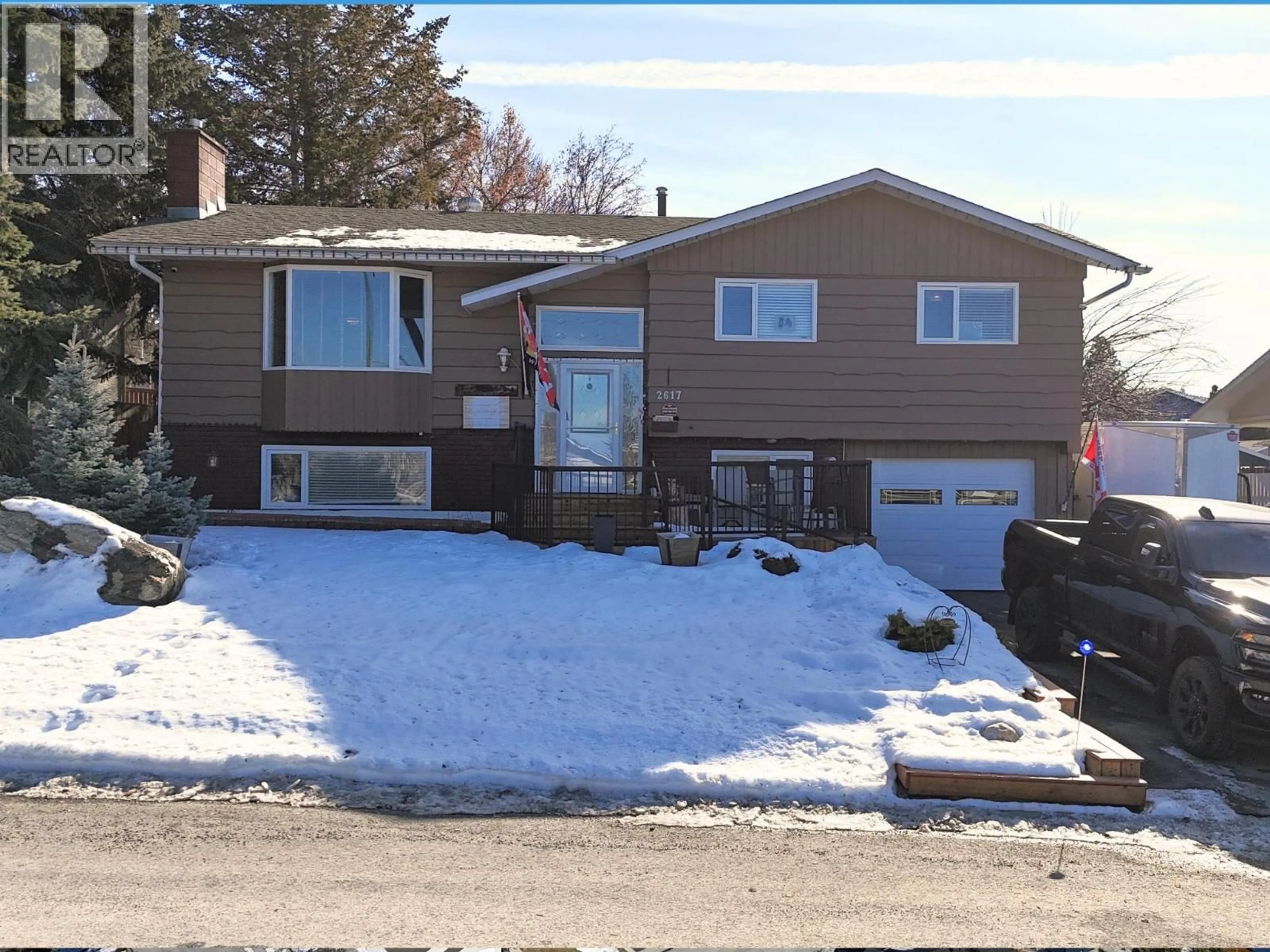 Home with vinyl exterior material, street for 2617 5TH STREET SOUTH, Cranbrook British Columbia V1C4W9