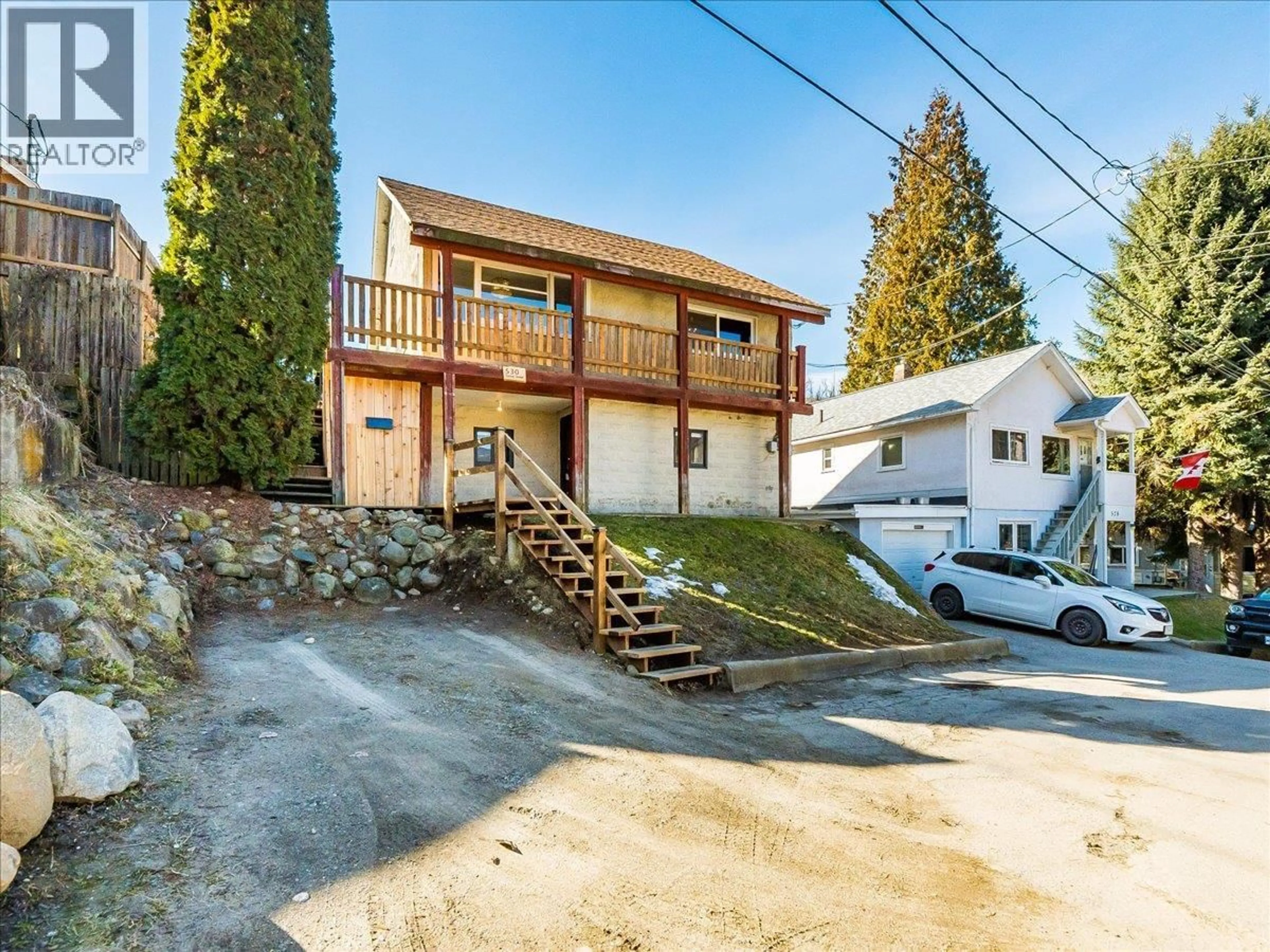 A pic from outside/outdoor area/front of a property/back of a property/a pic from drone, street for 530 TURNER STREET, Warfield British Columbia V1R2K2