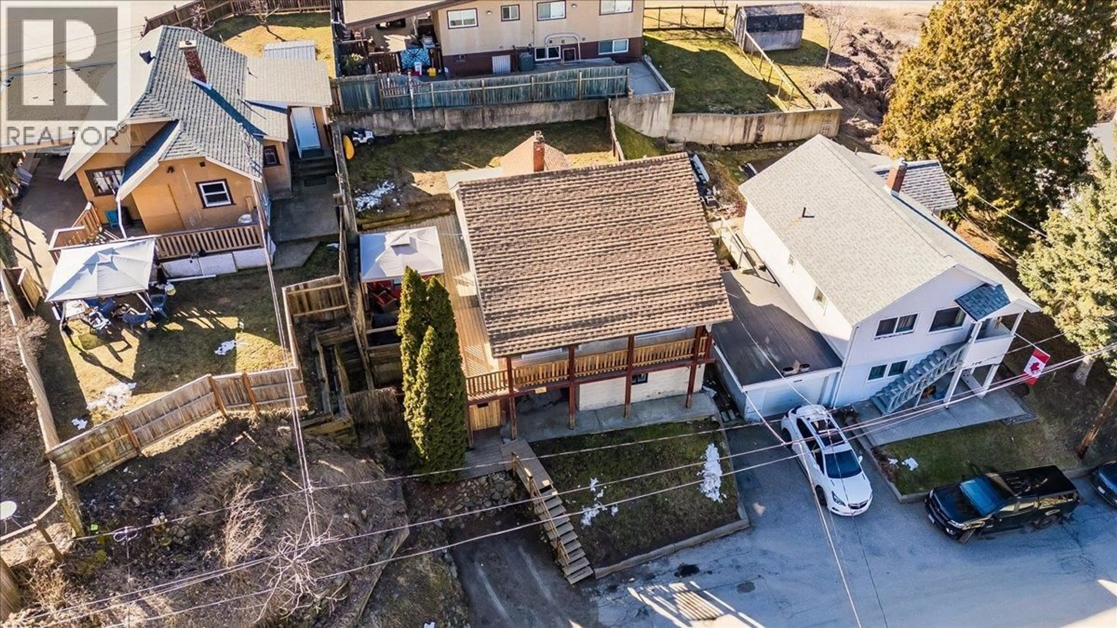 A pic from outside/outdoor area/front of a property/back of a property/a pic from drone, street for 530 TURNER STREET, Warfield British Columbia V1R2K2