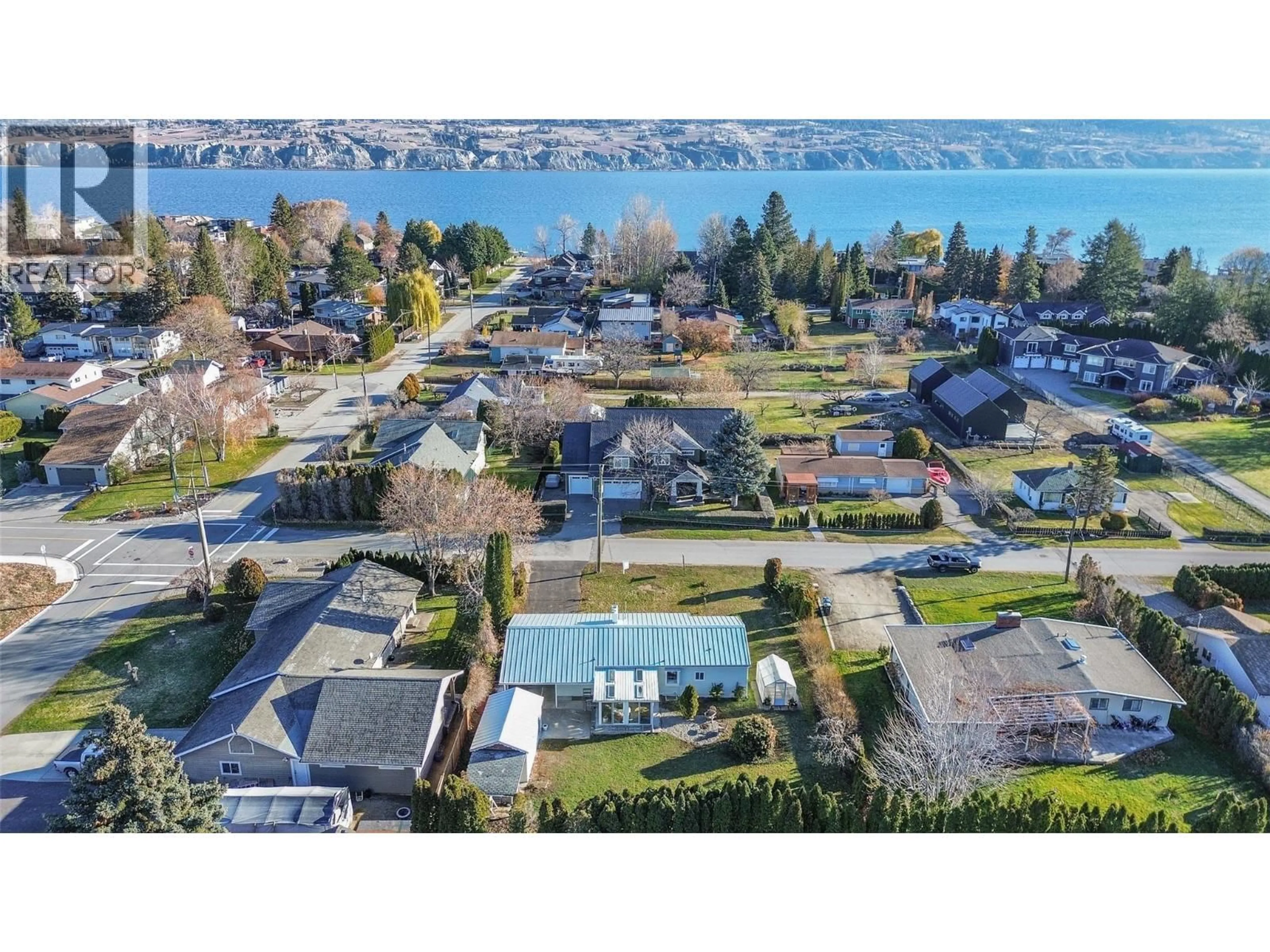A pic from outside/outdoor area/front of a property/back of a property/a pic from drone, water/lake/river/ocean view for 5214 NIXON ROAD, Summerland British Columbia V0H1Z9