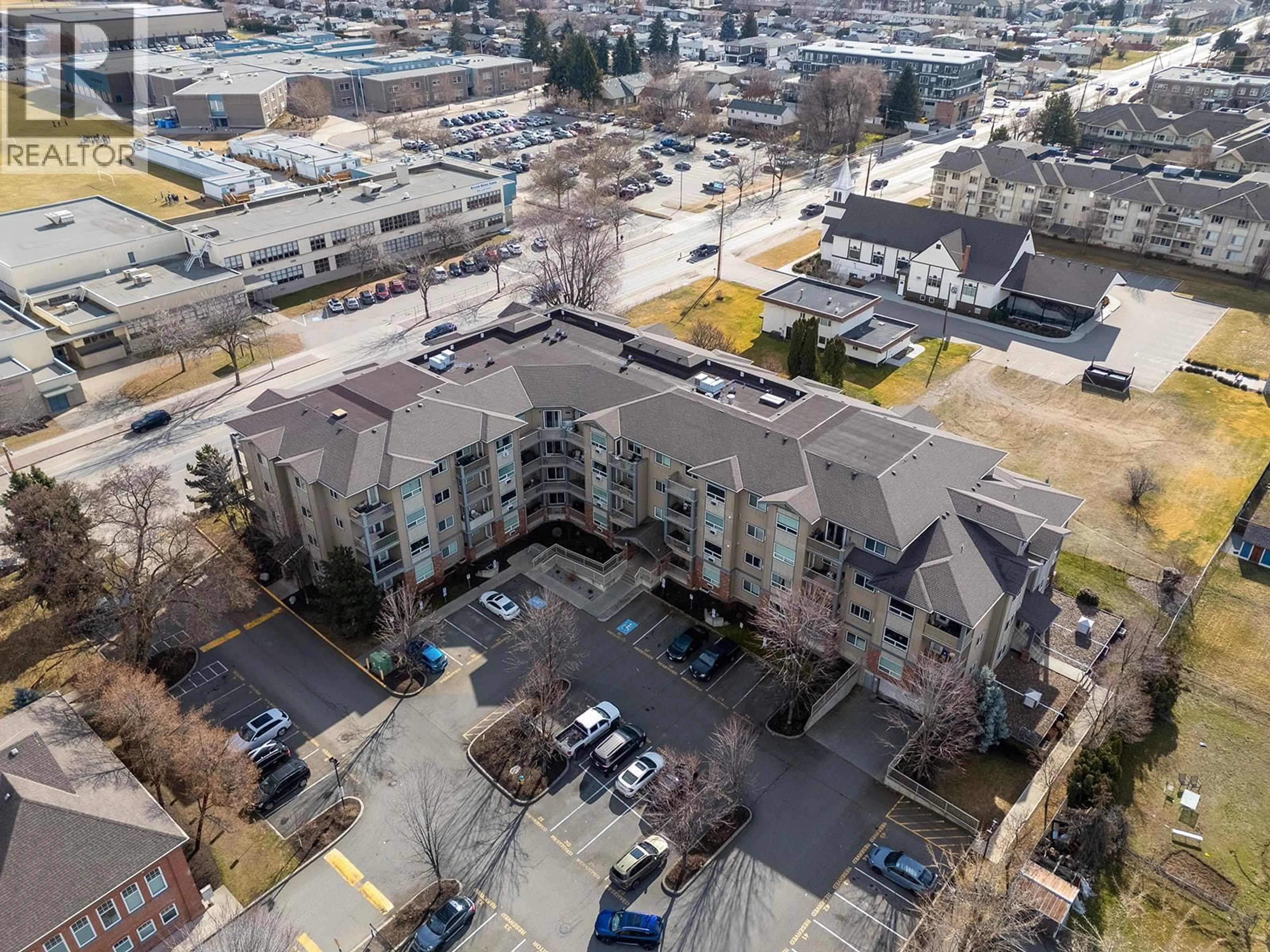 A pic from outside/outdoor area/front of a property/back of a property/a pic from drone, city buildings view from balcony for 303 - 770 RUTLAND ROAD NORTH, Kelowna British Columbia V1X3B7