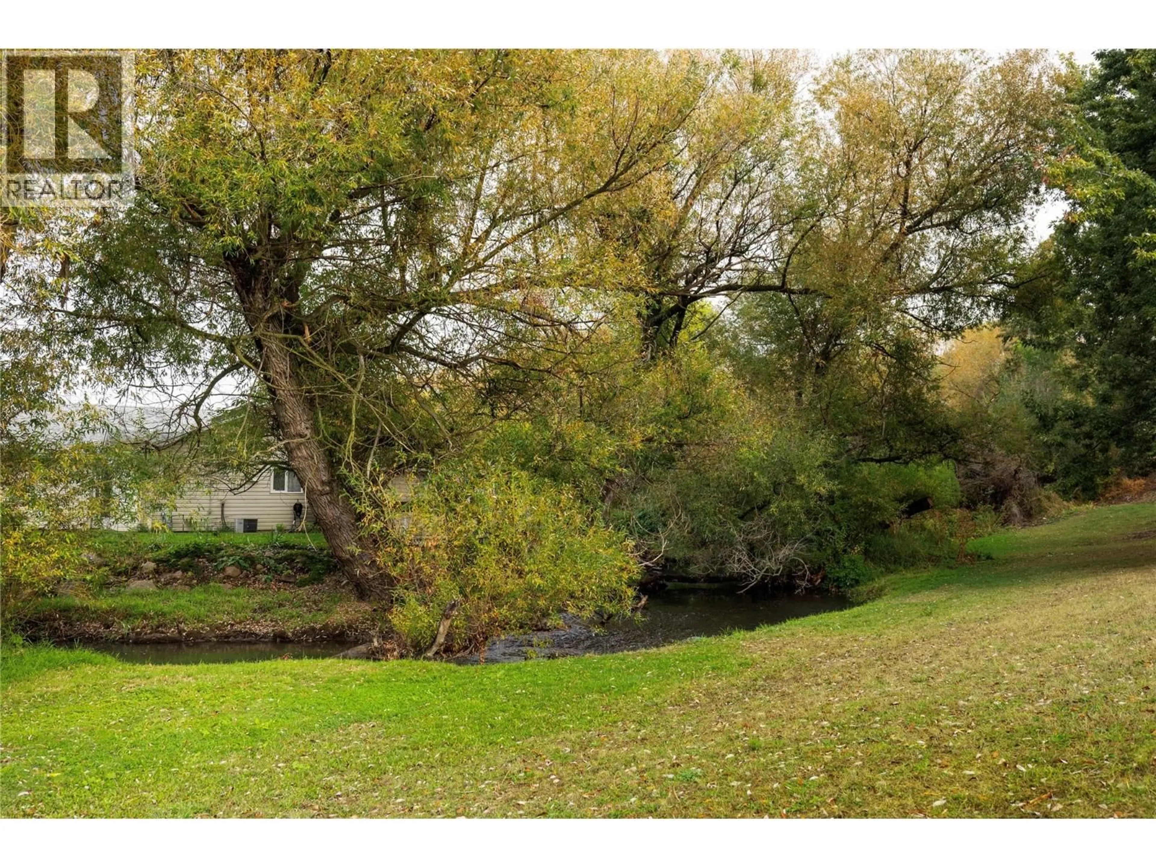 A pic from outside/outdoor area/front of a property/back of a property/a pic from drone, forest/trees view for 39 - 3413 OKANAGAN AVENUE, Vernon British Columbia V1T1K4