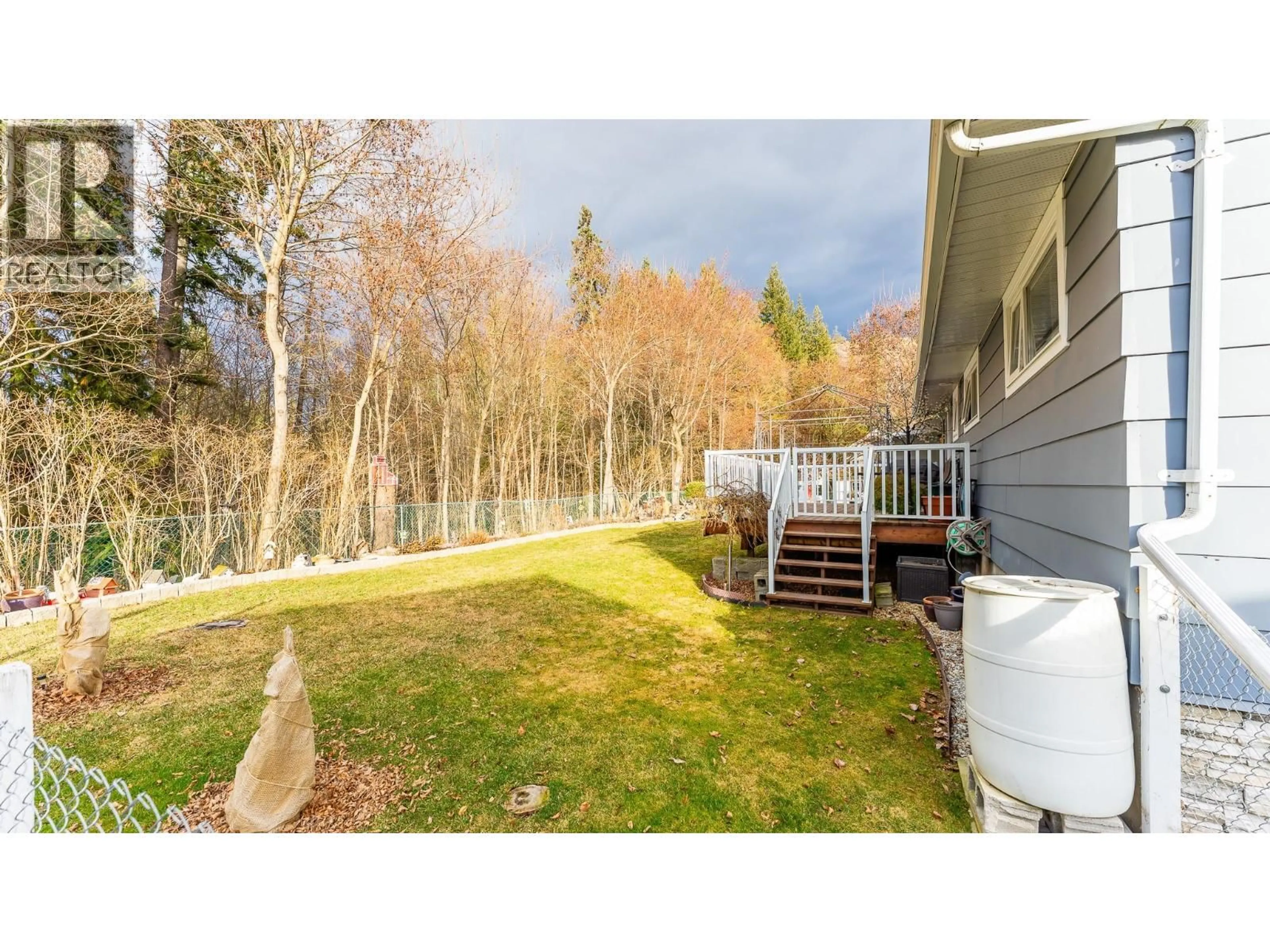 A pic from outside/outdoor area/front of a property/back of a property/a pic from drone, forest/trees view for 3451 7 AVENUE SOUTHEAST, Salmon Arm British Columbia V1E2C4