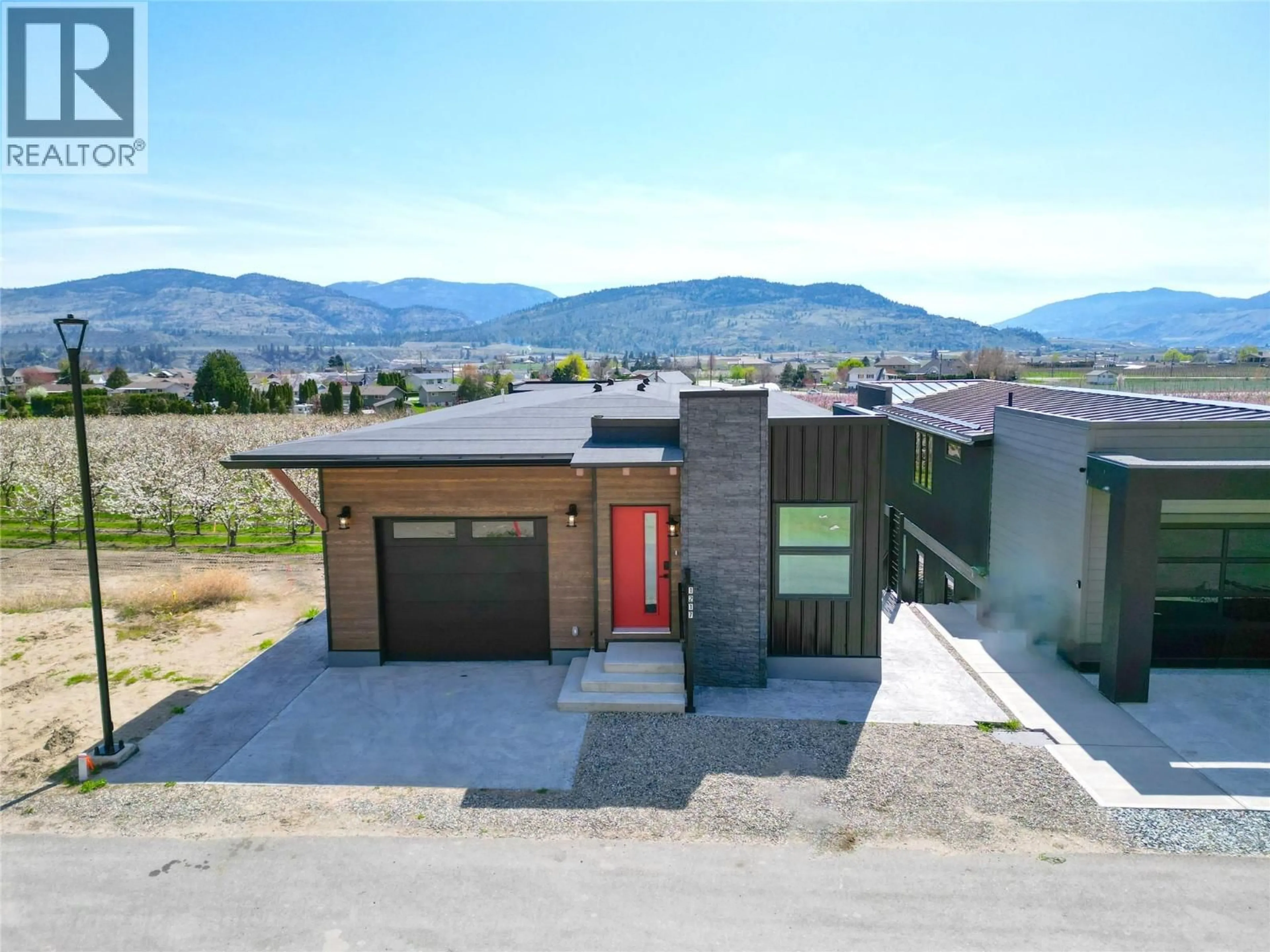 A pic from outside/outdoor area/front of a property/back of a property/a pic from drone, mountain view for 1217 COPPER ROAD, Oliver British Columbia V0H1T5
