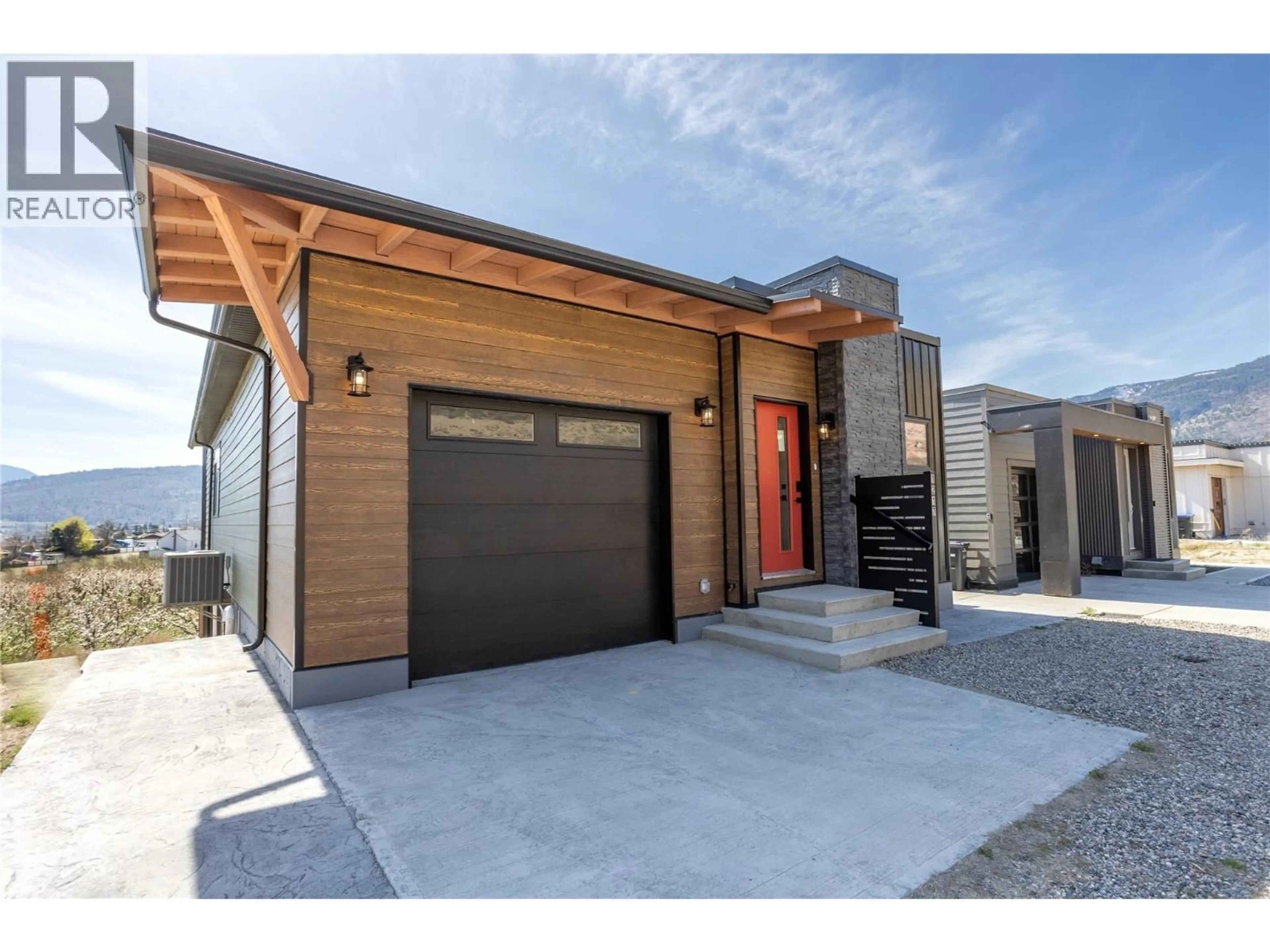 Home with brick exterior material, street for 1217 COPPER ROAD, Oliver British Columbia V0H1T5