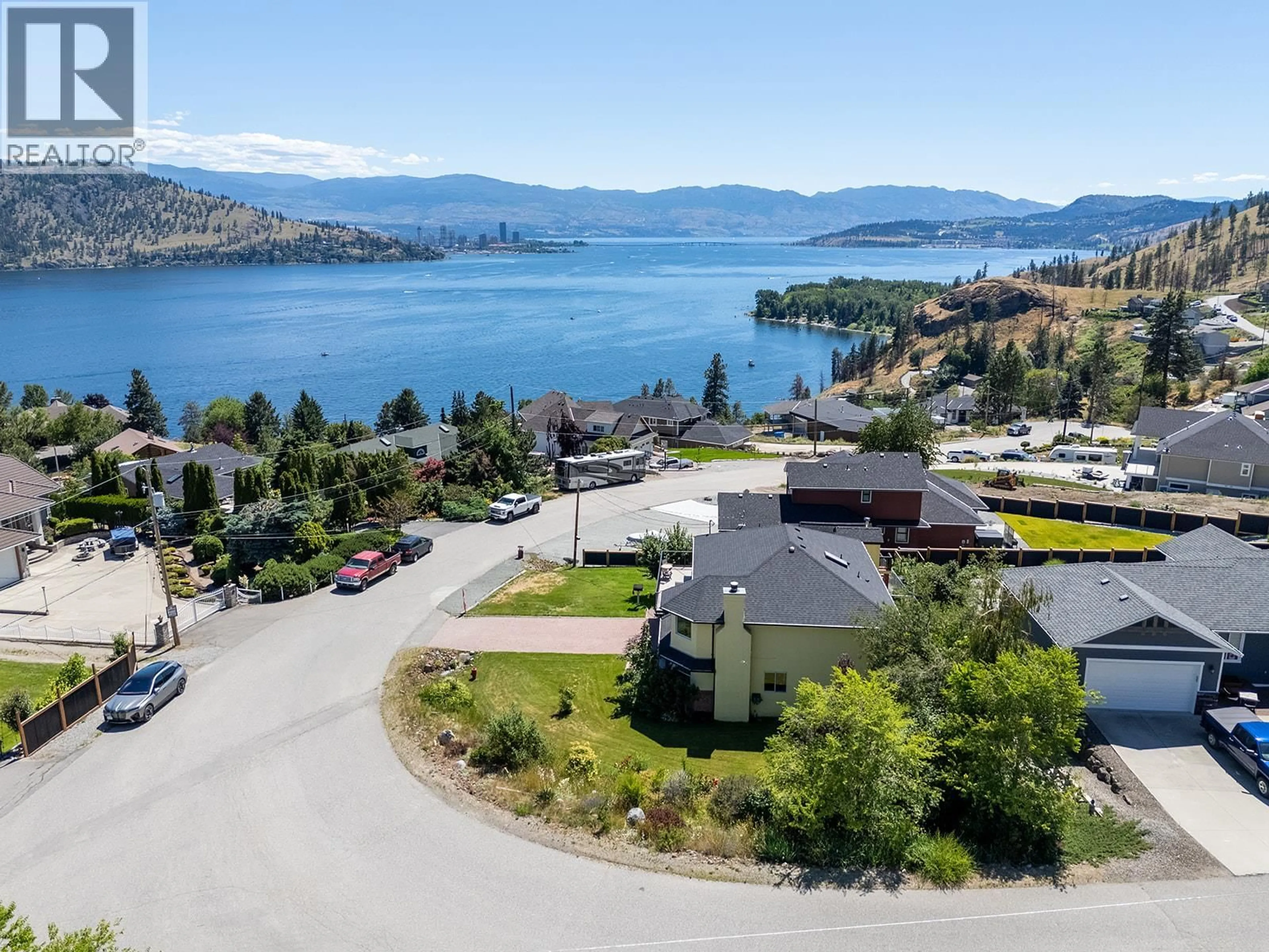 A pic from outside/outdoor area/front of a property/back of a property/a pic from drone, water/lake/river/ocean view for 145 HELDON COURT, Kelowna British Columbia V1Z3S5