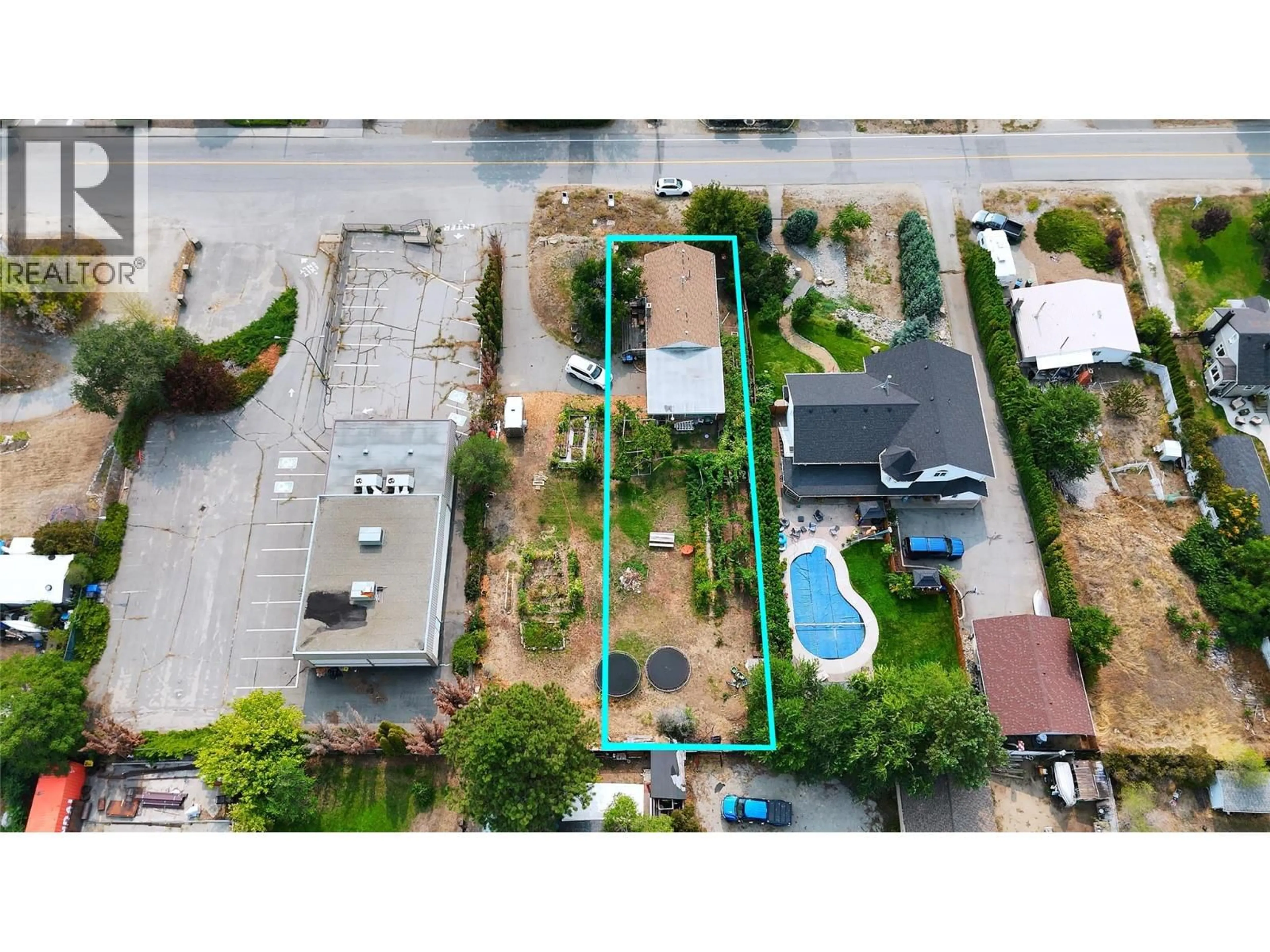 A pic from outside/outdoor area/front of a property/back of a property/a pic from drone, street for 9704 JULIA STREET, Summerland British Columbia V0H1Z5