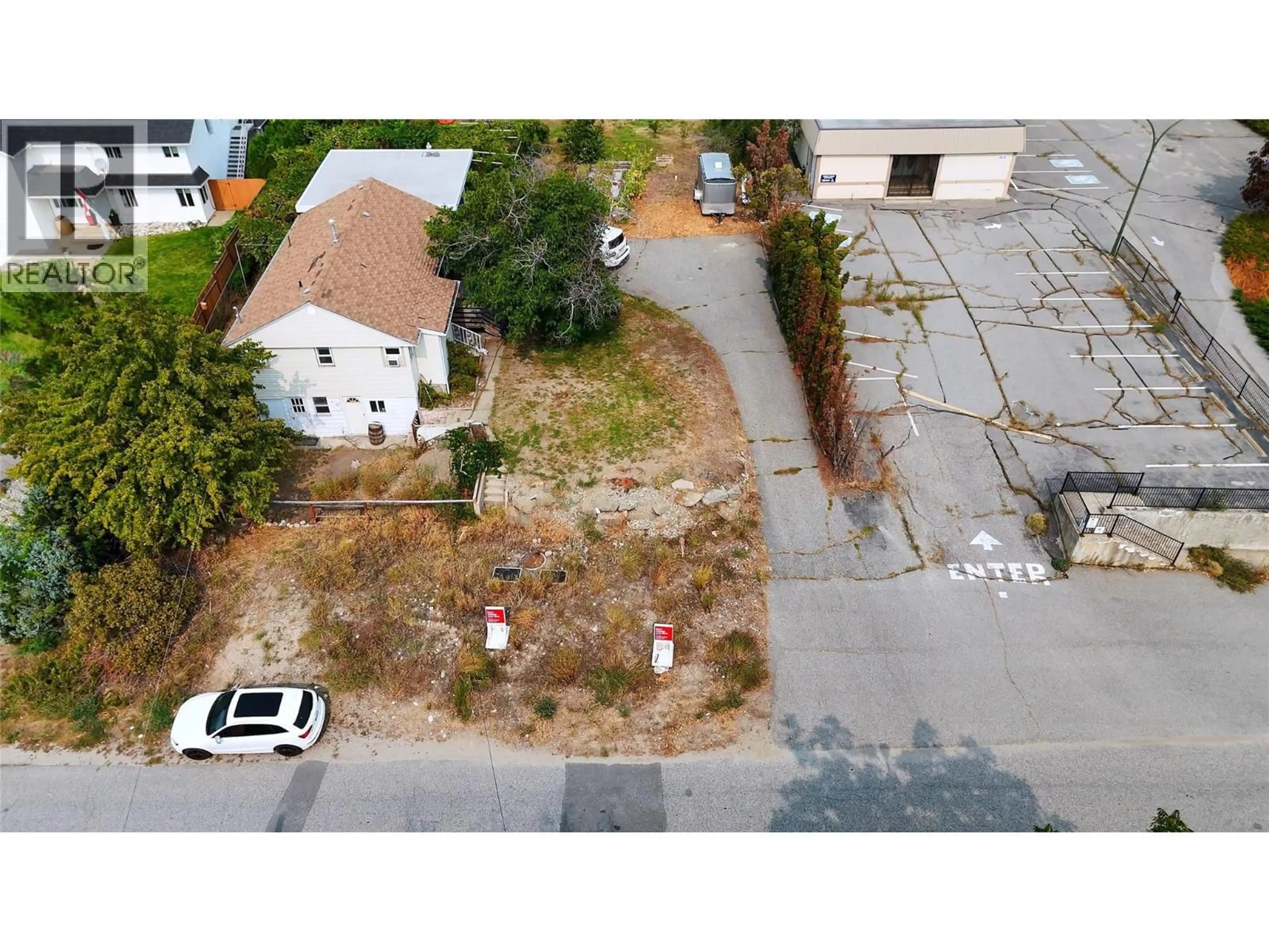 A pic from outside/outdoor area/front of a property/back of a property/a pic from drone, street for 9704 JULIA STREET, Summerland British Columbia V0H1Z5