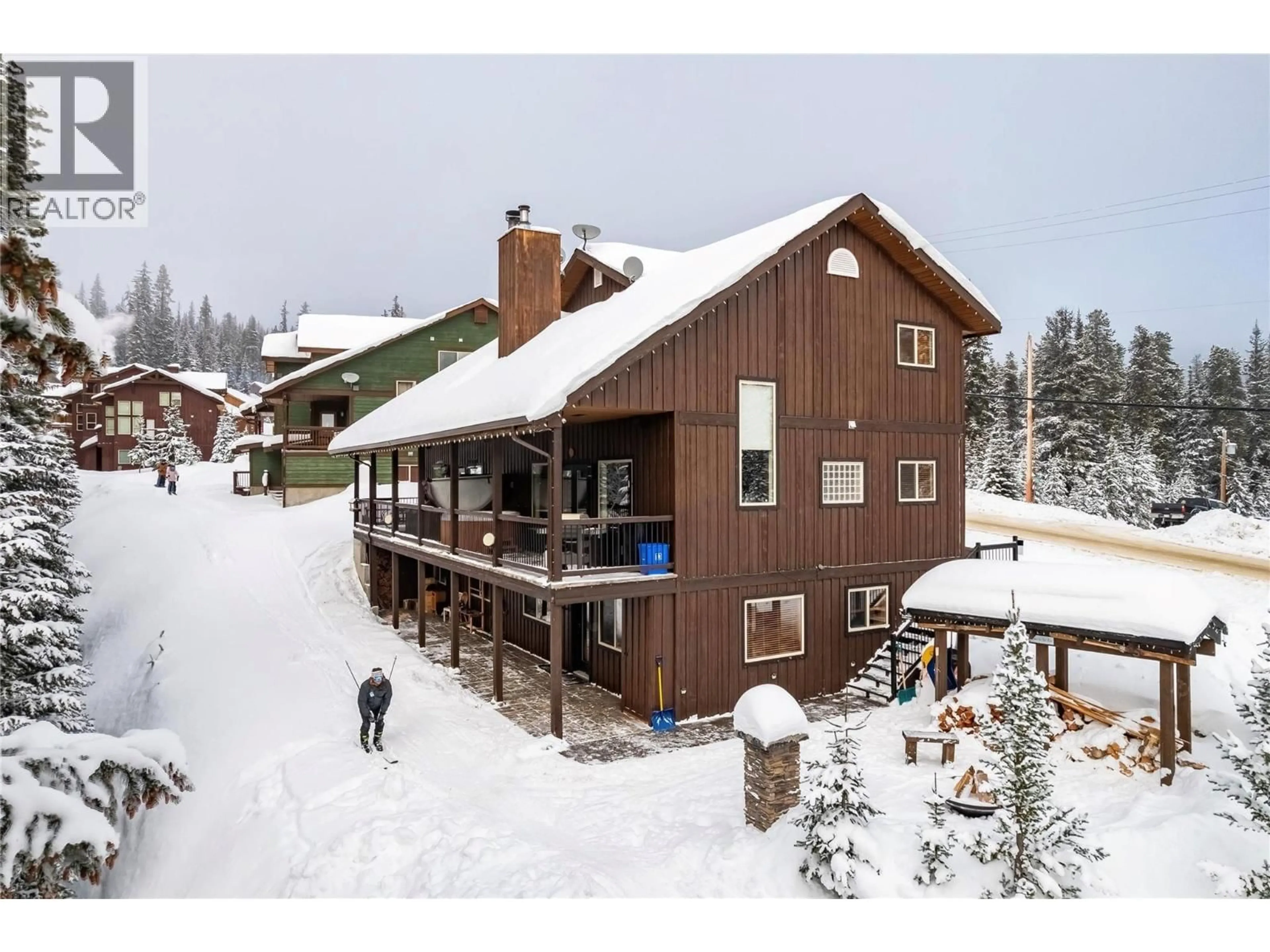 A pic from outside/outdoor area/front of a property/back of a property/a pic from drone, unknown for 1 - 1211 APEX MOUNTAIN ROAD, Penticton British Columbia V2A0E2