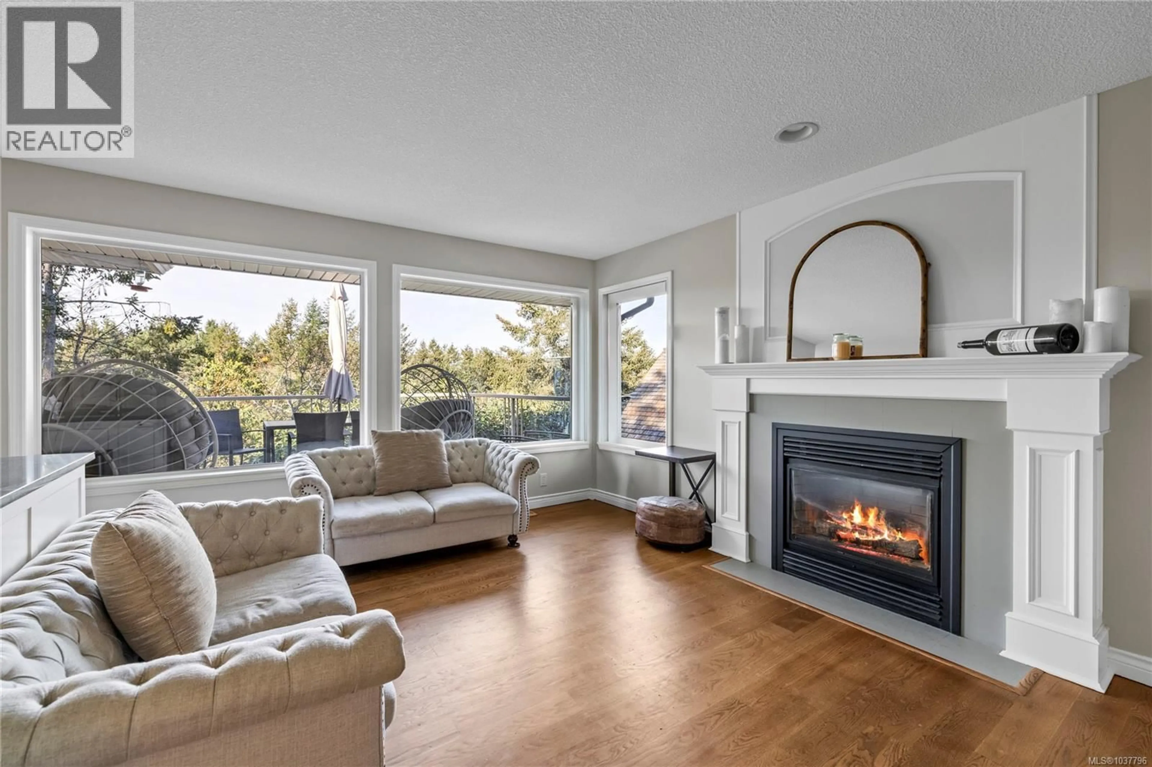 Living room with furniture, wood/laminate floor for 3541 SHELBY LANE, Nanoose Bay British Columbia V9P9J8