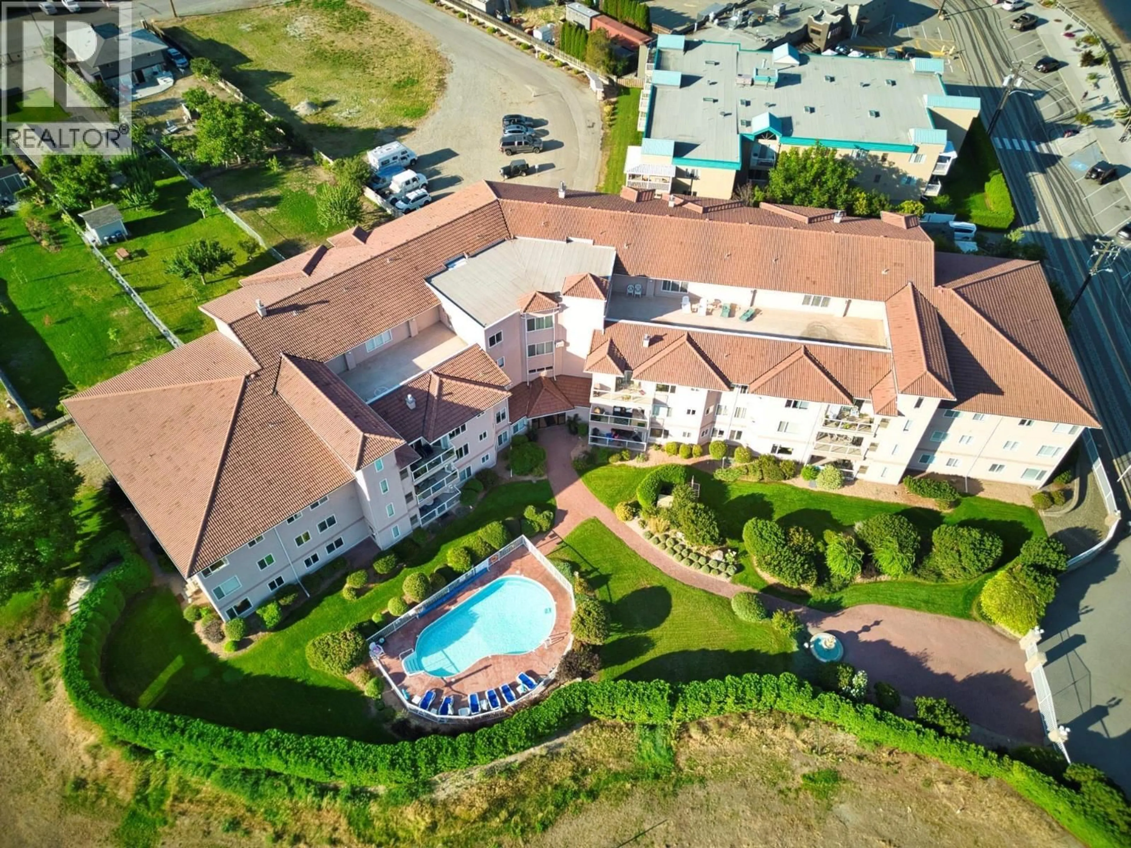 A pic from outside/outdoor area/front of a property/back of a property/a pic from drone, unknown for 100 - 6805 COTTONWOOD DRIVE, Osoyoos British Columbia V0H1V3