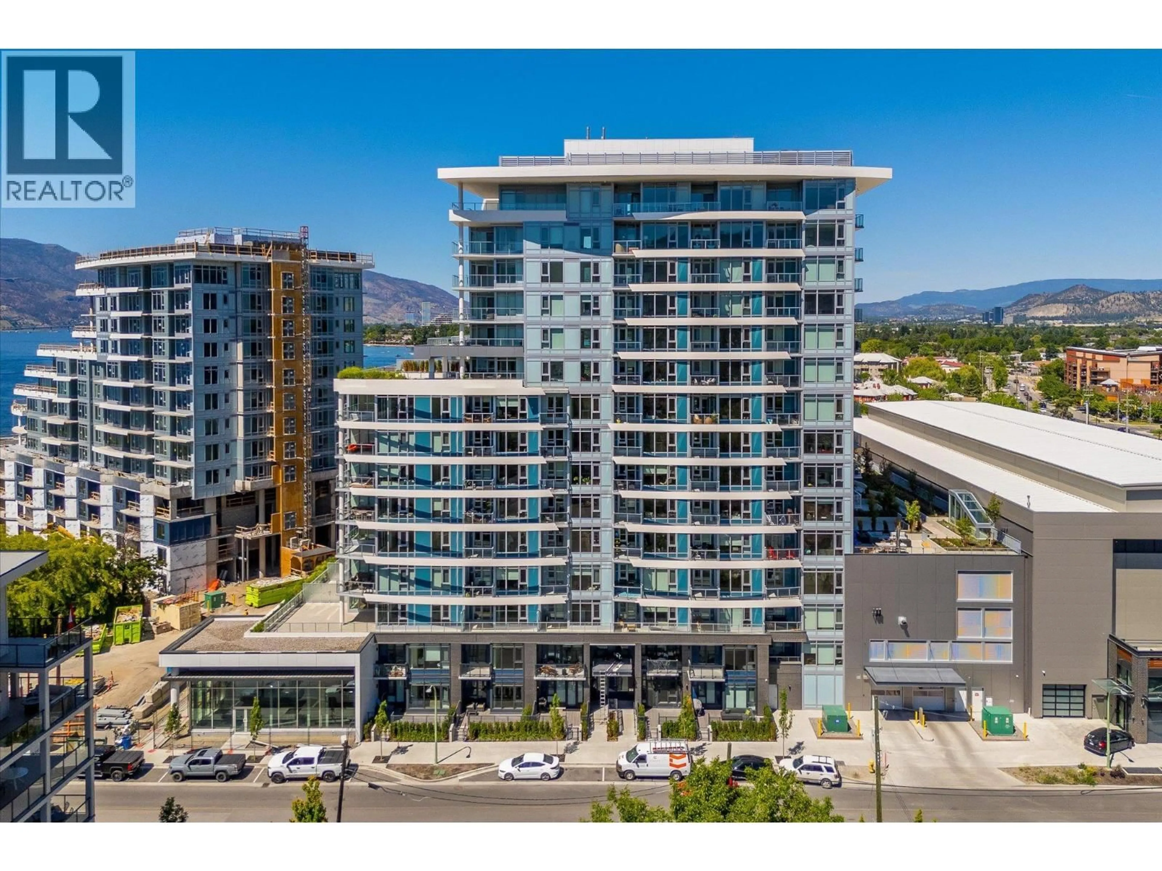 A pic from outside/outdoor area/front of a property/back of a property/a pic from drone, city buildings view from balcony for 512 - 3699 CAPOZZI ROAD, Kelowna British Columbia V1W0G3