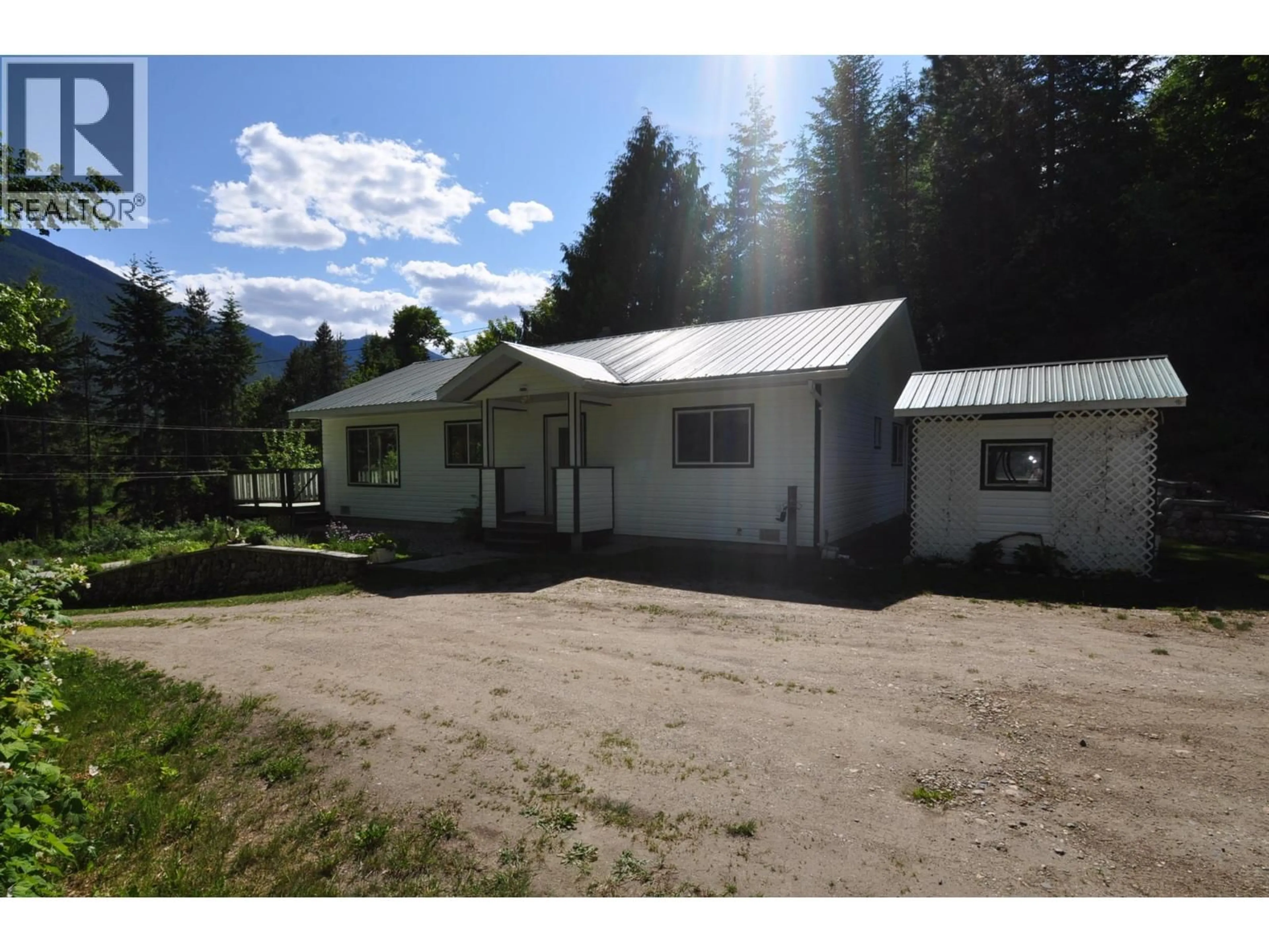A pic from outside/outdoor area/front of a property/back of a property/a pic from drone, building for 8917 MEADOW STREET, Balfour British Columbia V0G1C0