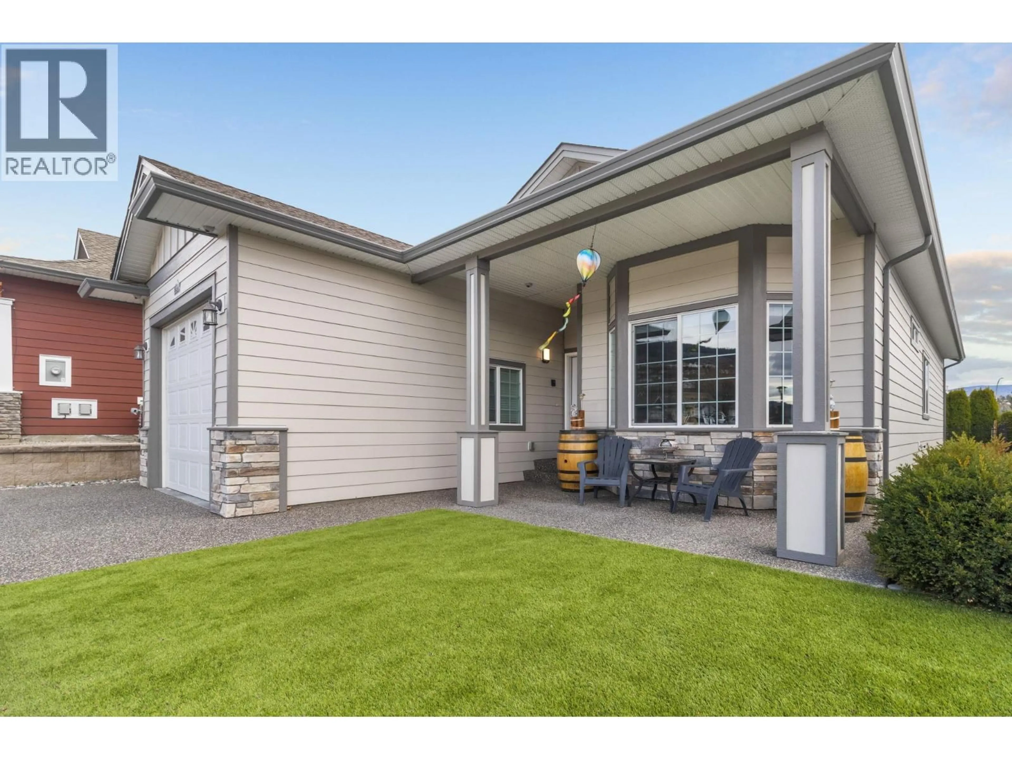 Home with vinyl exterior material, street for 3377 KINGFISHER ROAD, Westbank British Columbia V4T3A5