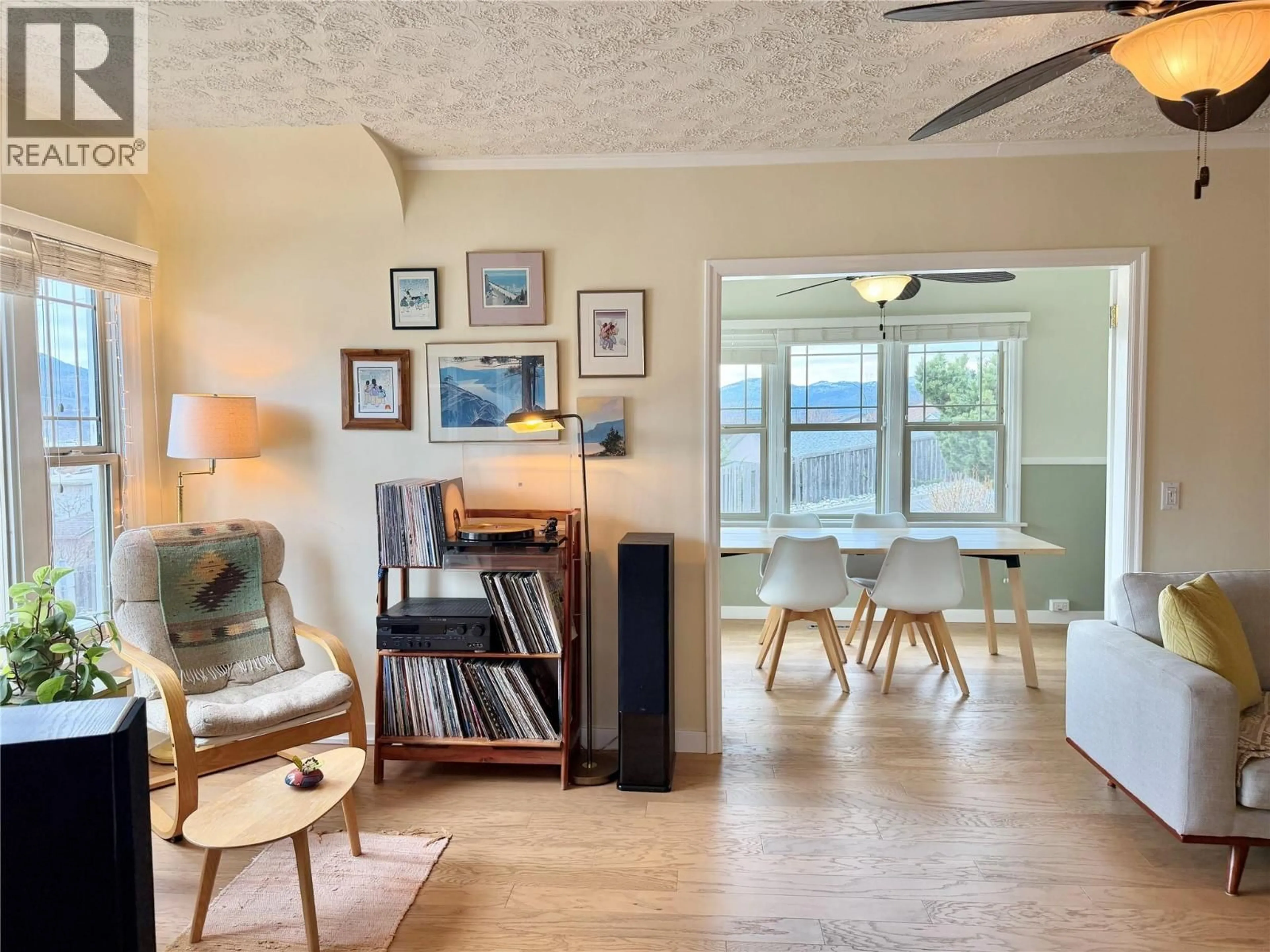 Living room with furniture, wood/laminate floor for 650 SCHOOL AVENUE, Oliver British Columbia V0H1T0