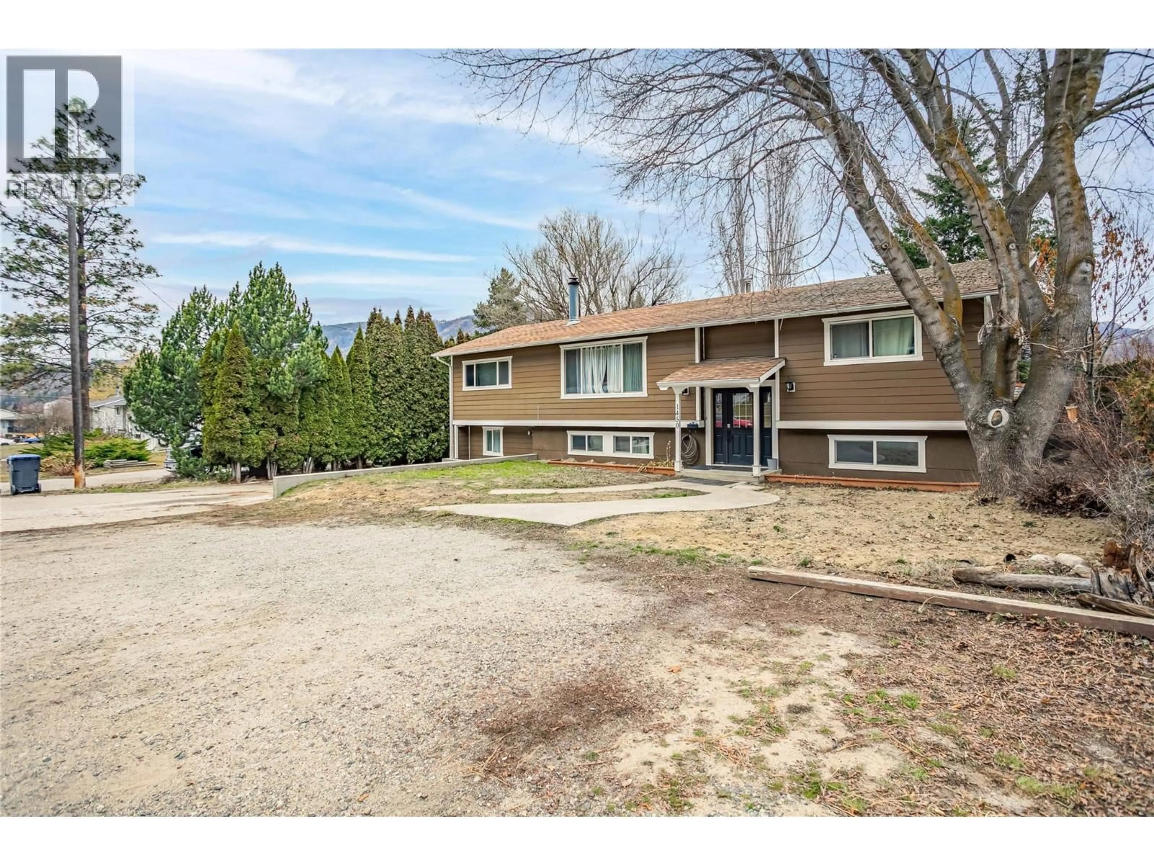 A pic from outside/outdoor area/front of a property/back of a property/a pic from drone, unknown for 1450 PONDEROSA ROAD, West Kelowna British Columbia V1Z1N1