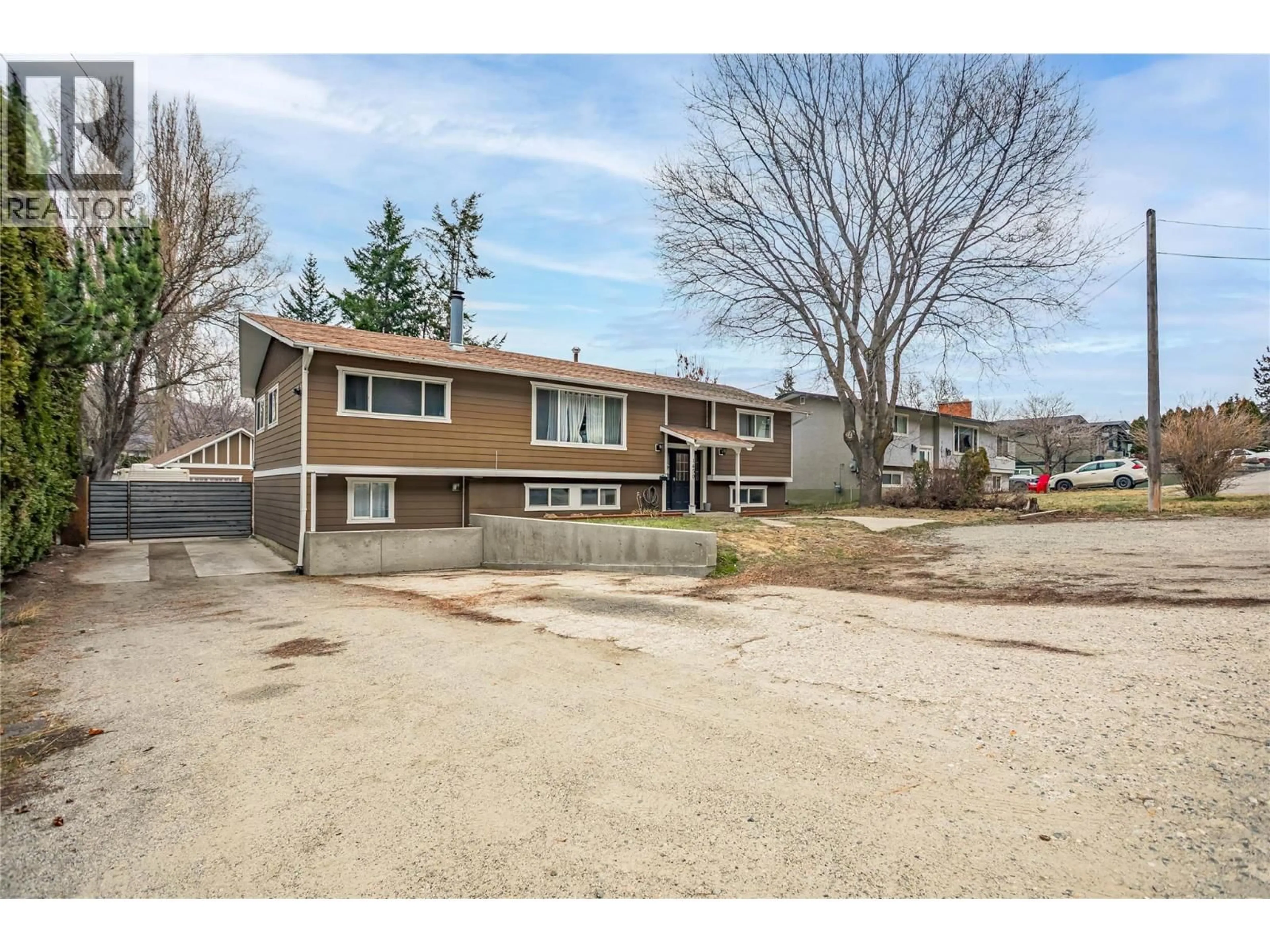 A pic from outside/outdoor area/front of a property/back of a property/a pic from drone, street for 1450 PONDEROSA ROAD, West Kelowna British Columbia V1Z1N1