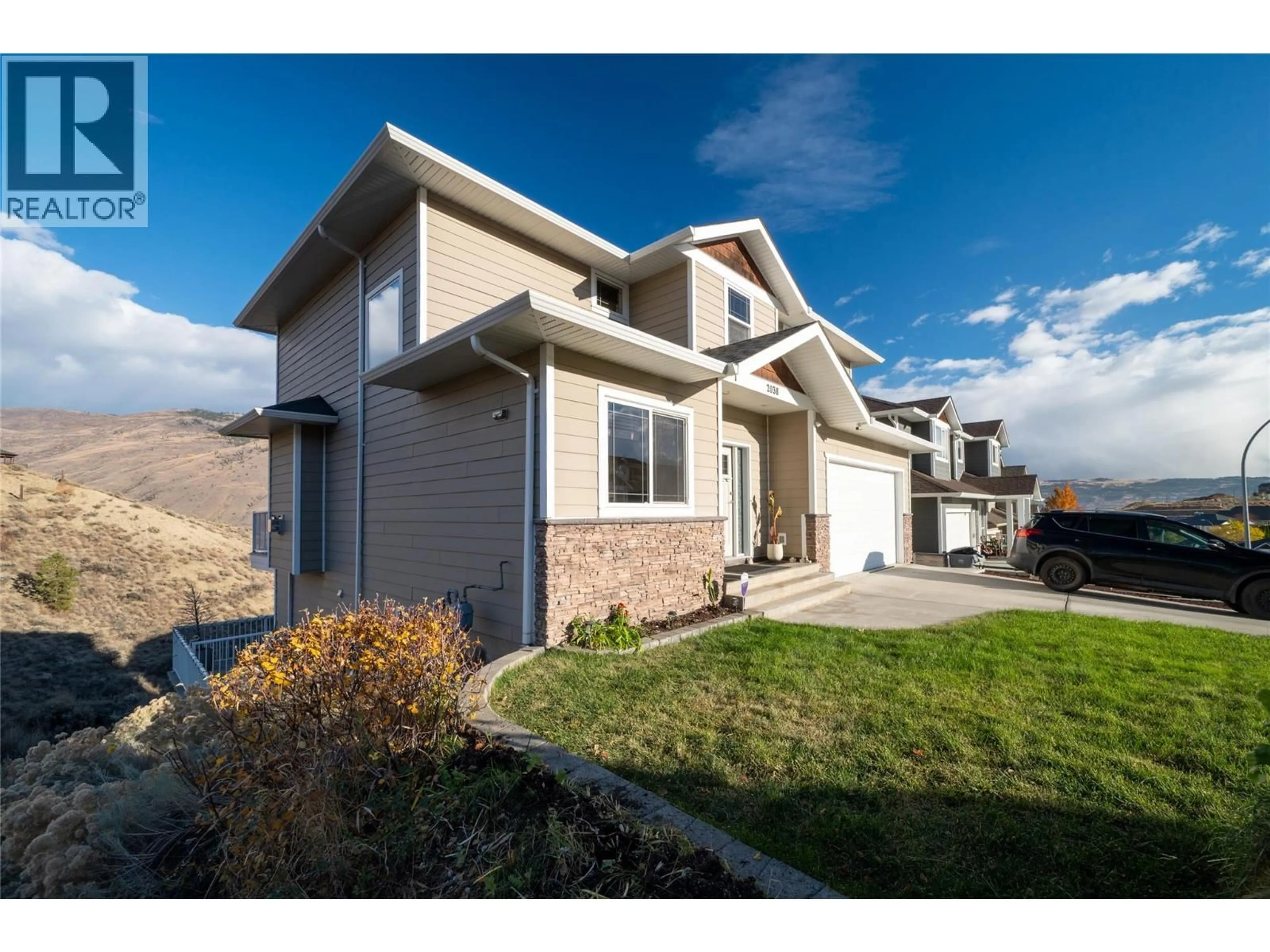 Home with vinyl exterior material, street for 2038 STAGECOACH DRIVE, Kamloops British Columbia V2B0A7