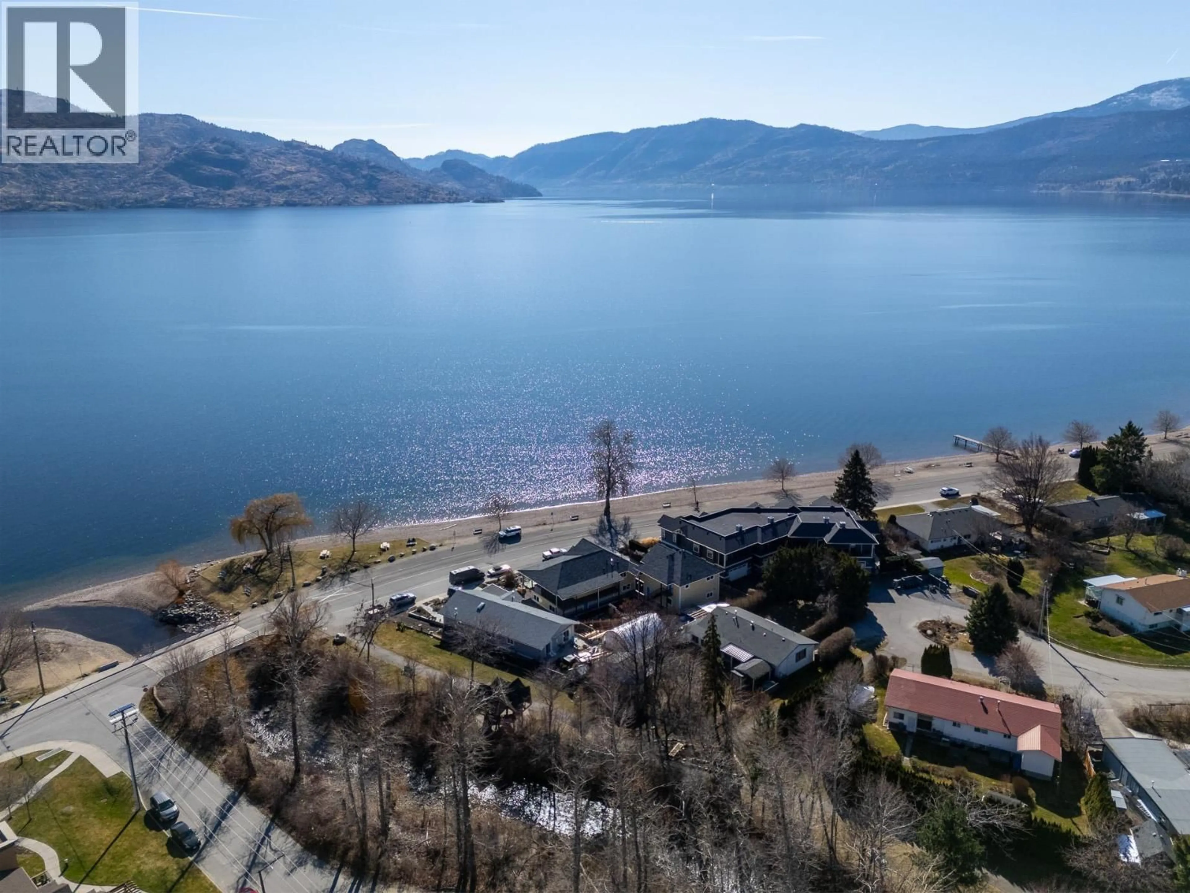 A pic from outside/outdoor area/front of a property/back of a property/a pic from drone, water/lake/river/ocean view for 4020 BEACH AVENUE, Peachland British Columbia V0H1X6