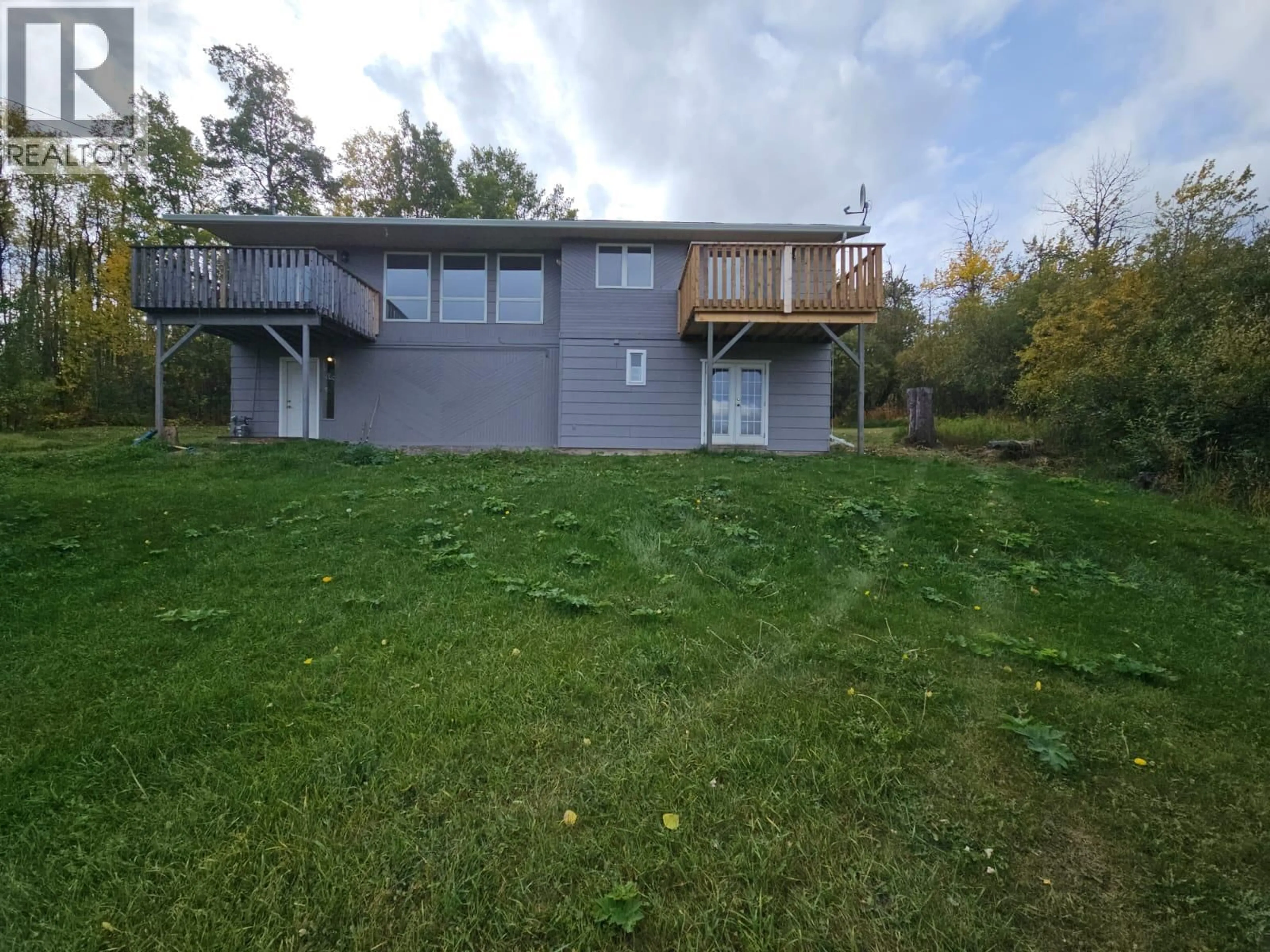 A pic from outside/outdoor area/front of a property/back of a property/a pic from drone, water/lake/river/ocean view for 3511 SPRUCE ROAD, Chetwynd British Columbia V0C1J0