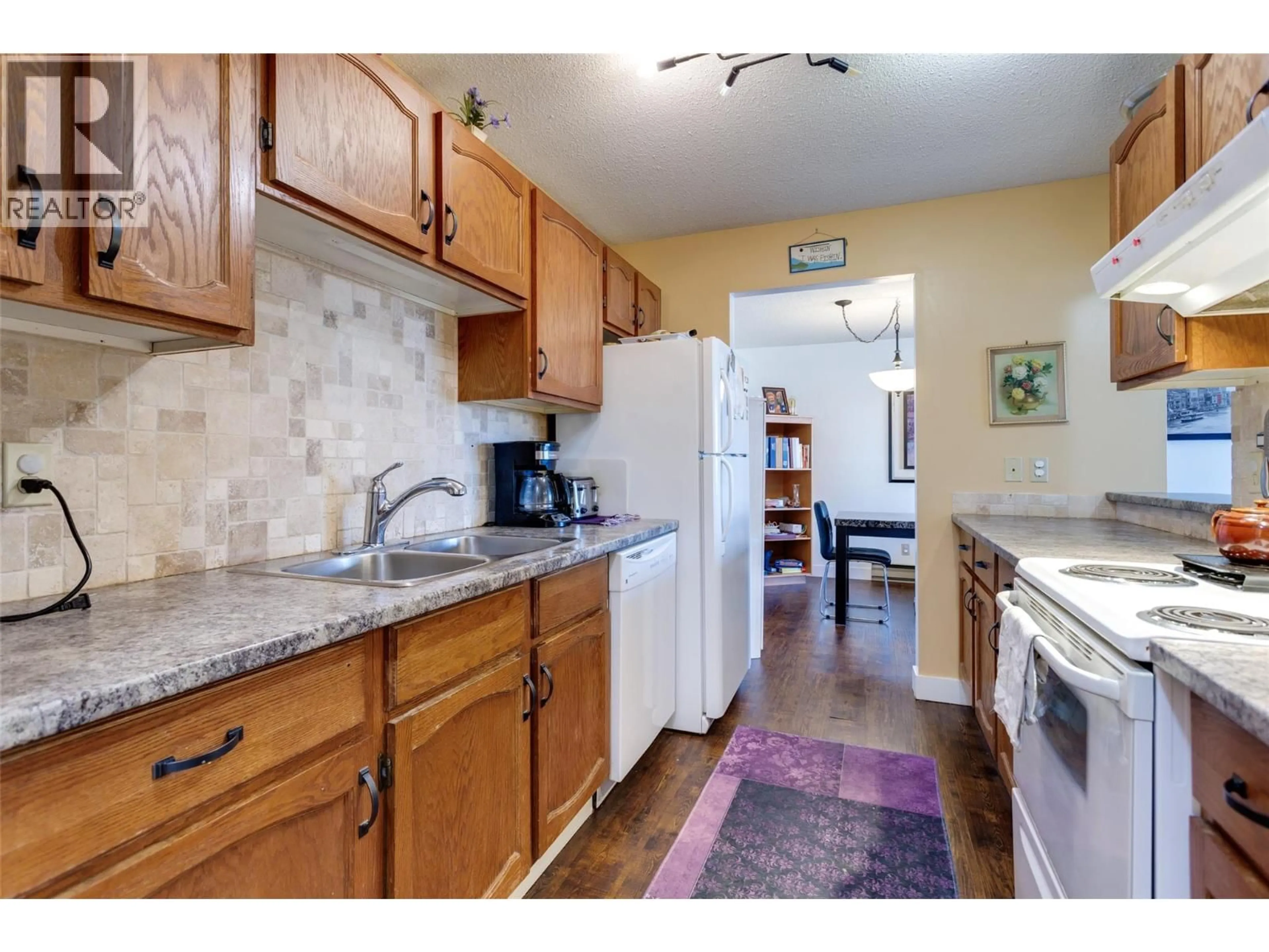 Standard kitchen, ceramic/tile floor for 206 - 1490B GORDON DRIVE, Kelowna British Columbia V1Y3G7