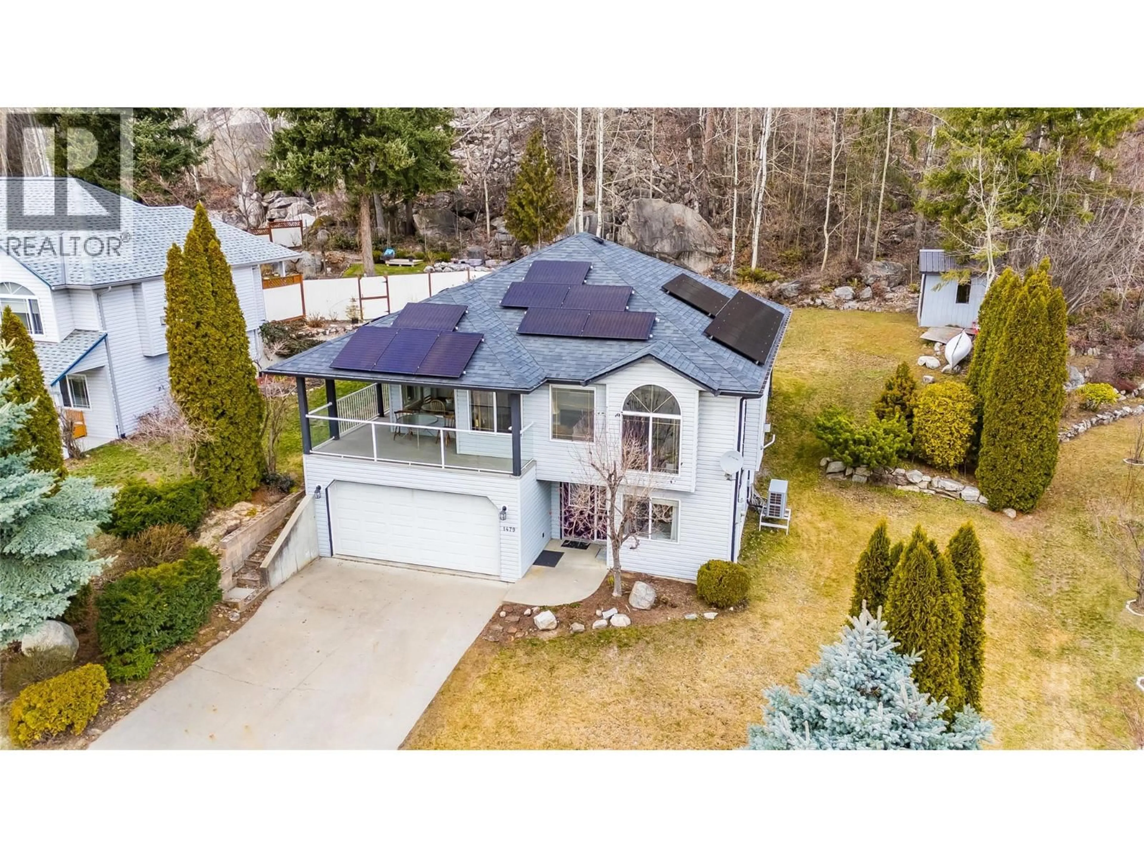 A pic from outside/outdoor area/front of a property/back of a property/a pic from drone, street for 1479 37TH STREET, Castlegar British Columbia V1N4J5