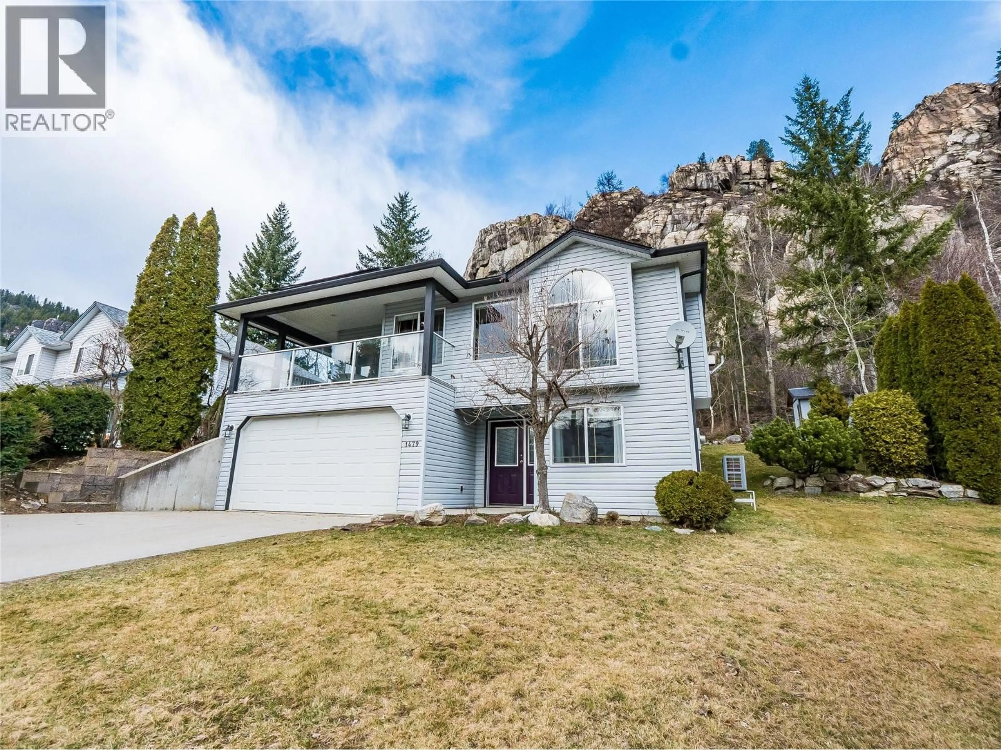 Home with vinyl exterior material, mountain view for 1479 37TH STREET, Castlegar British Columbia V1N4J5