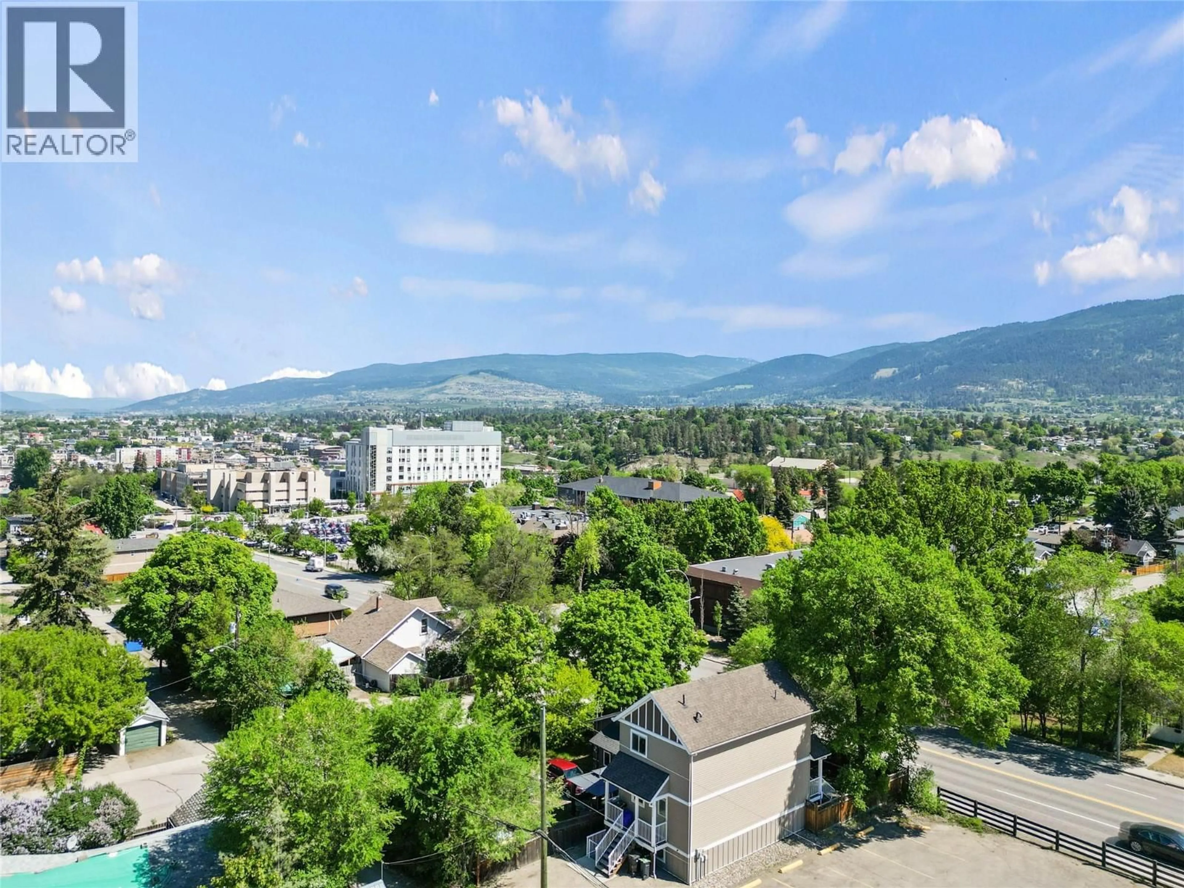 A pic from outside/outdoor area/front of a property/back of a property/a pic from drone, mountain view for 1606 32 STREET, Vernon British Columbia V1T5K5