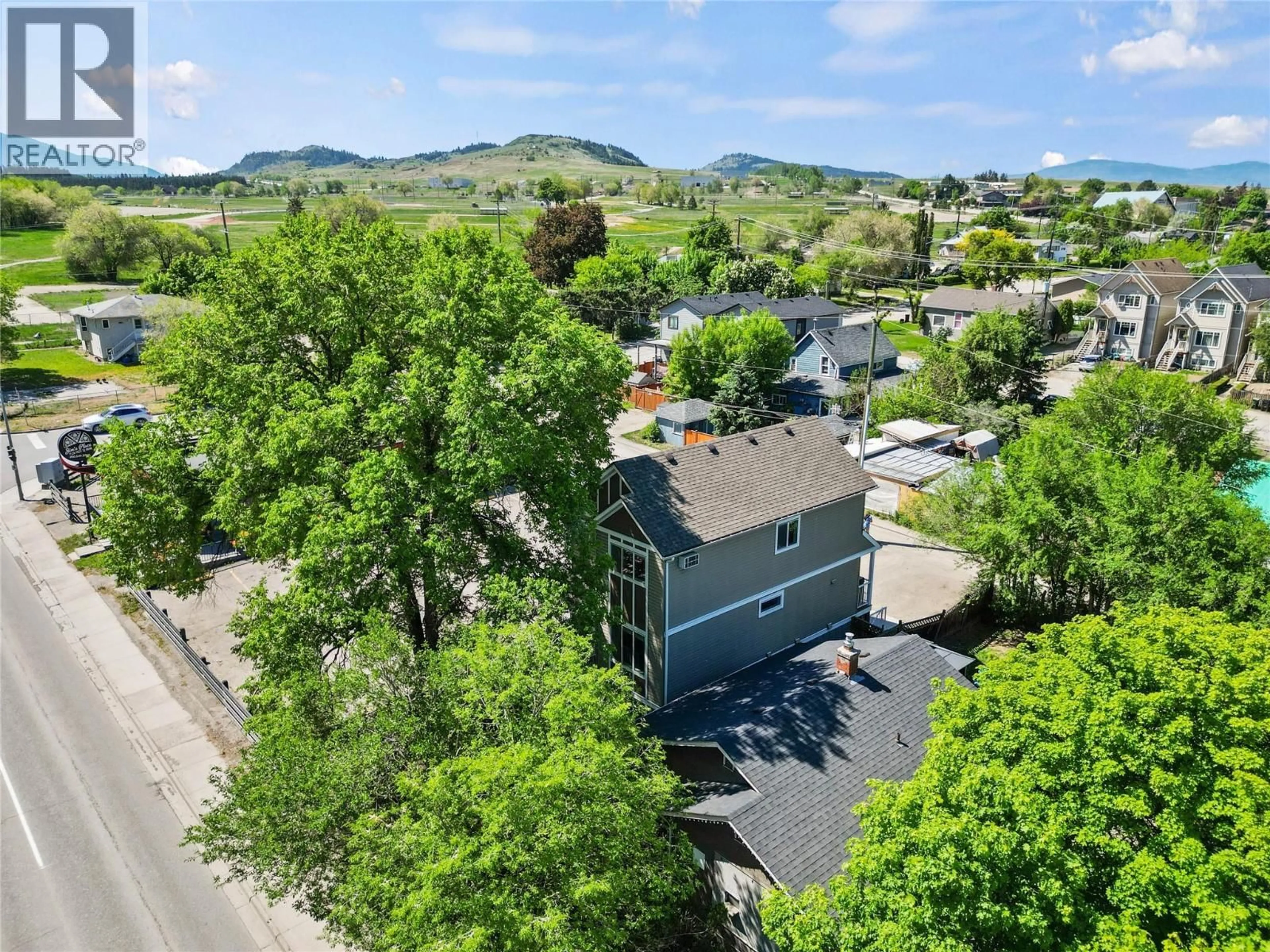 A pic from outside/outdoor area/front of a property/back of a property/a pic from drone, mountain view for 1606 32 STREET, Vernon British Columbia V1T5K5