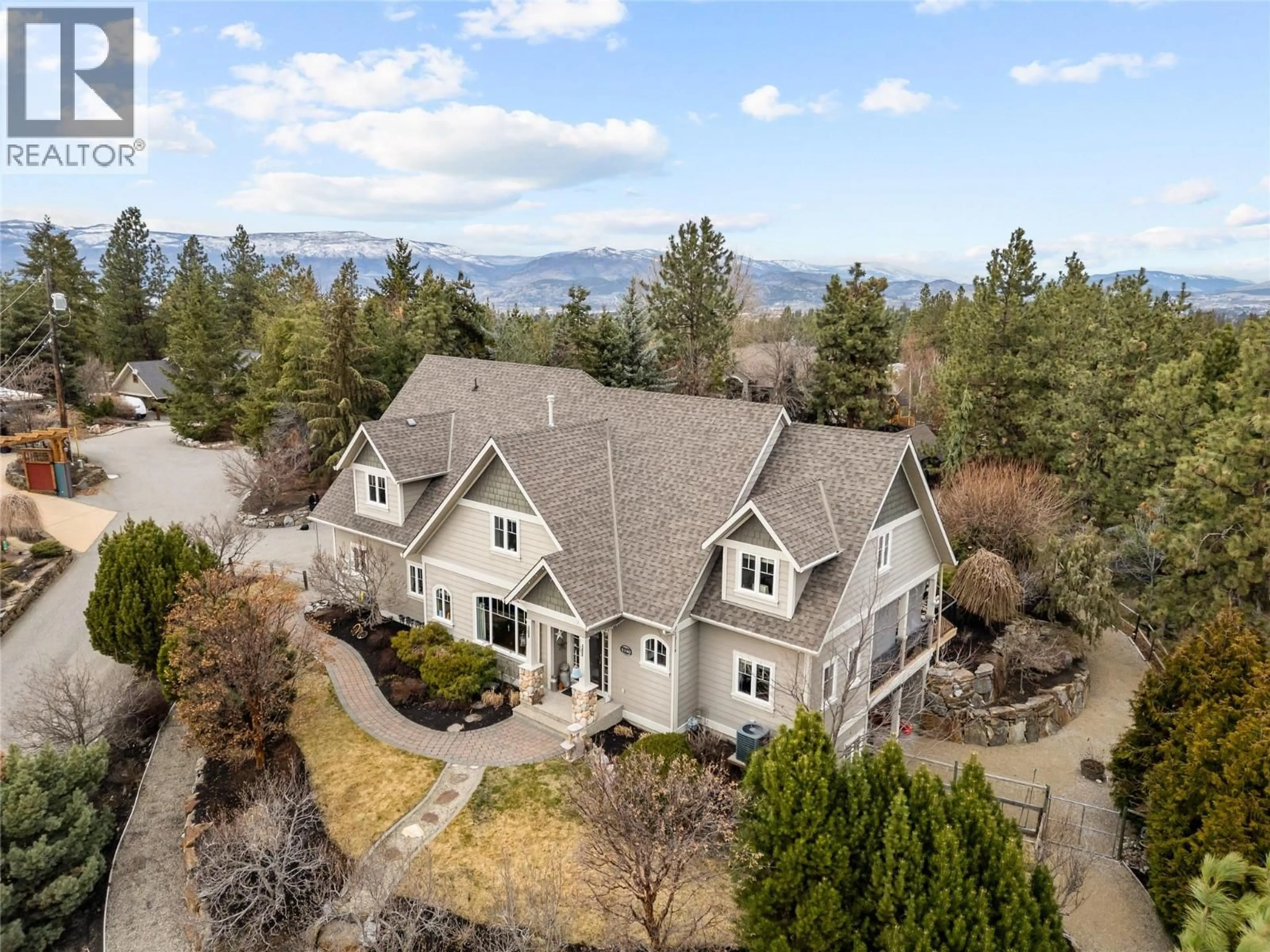 A pic from outside/outdoor area/front of a property/back of a property/a pic from drone, mountain view for 4140 SEDDON ROAD, Kelowna British Columbia V1W4C9