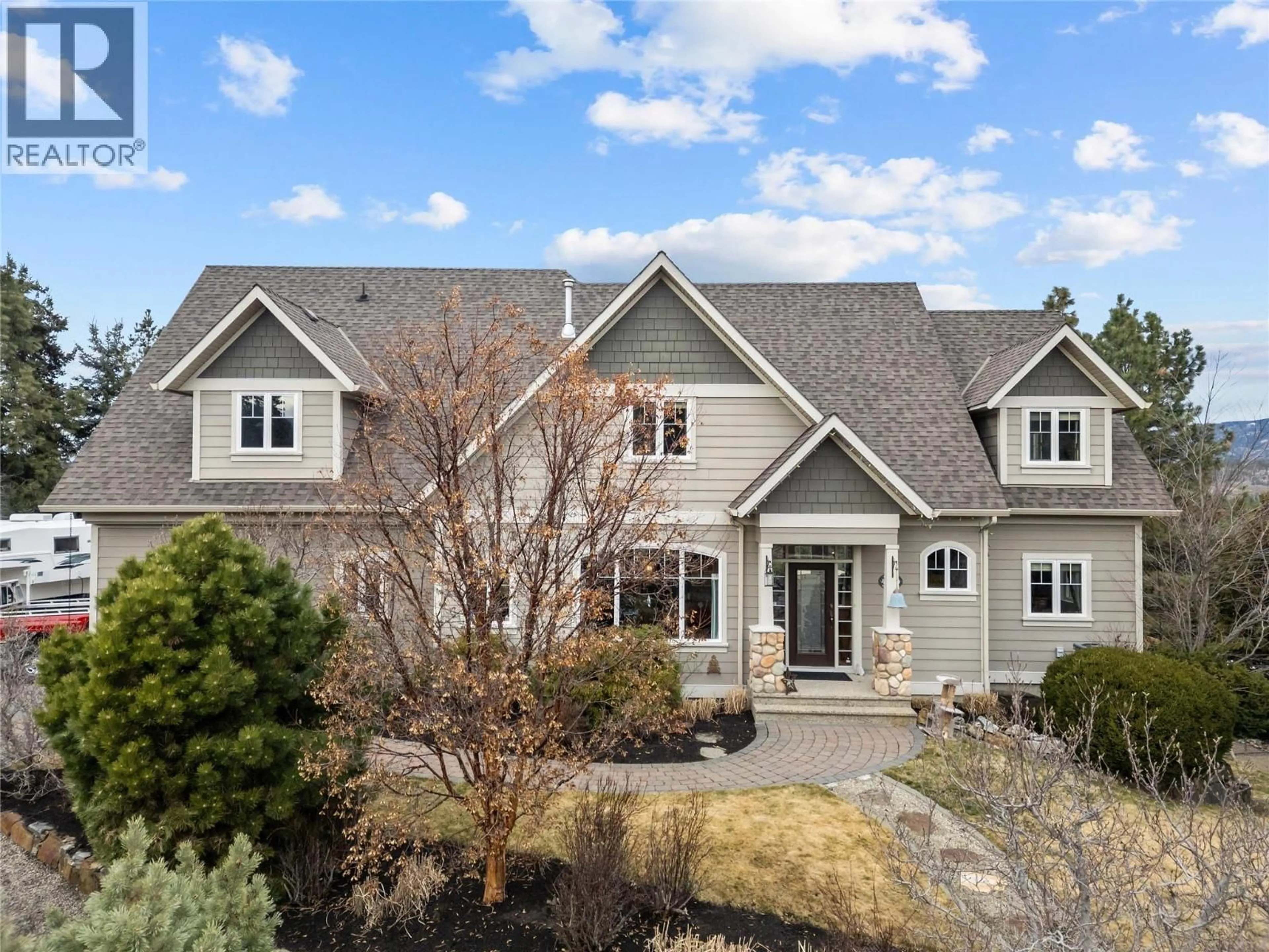 Home with vinyl exterior material, street for 4140 SEDDON ROAD, Kelowna British Columbia V1W4C9