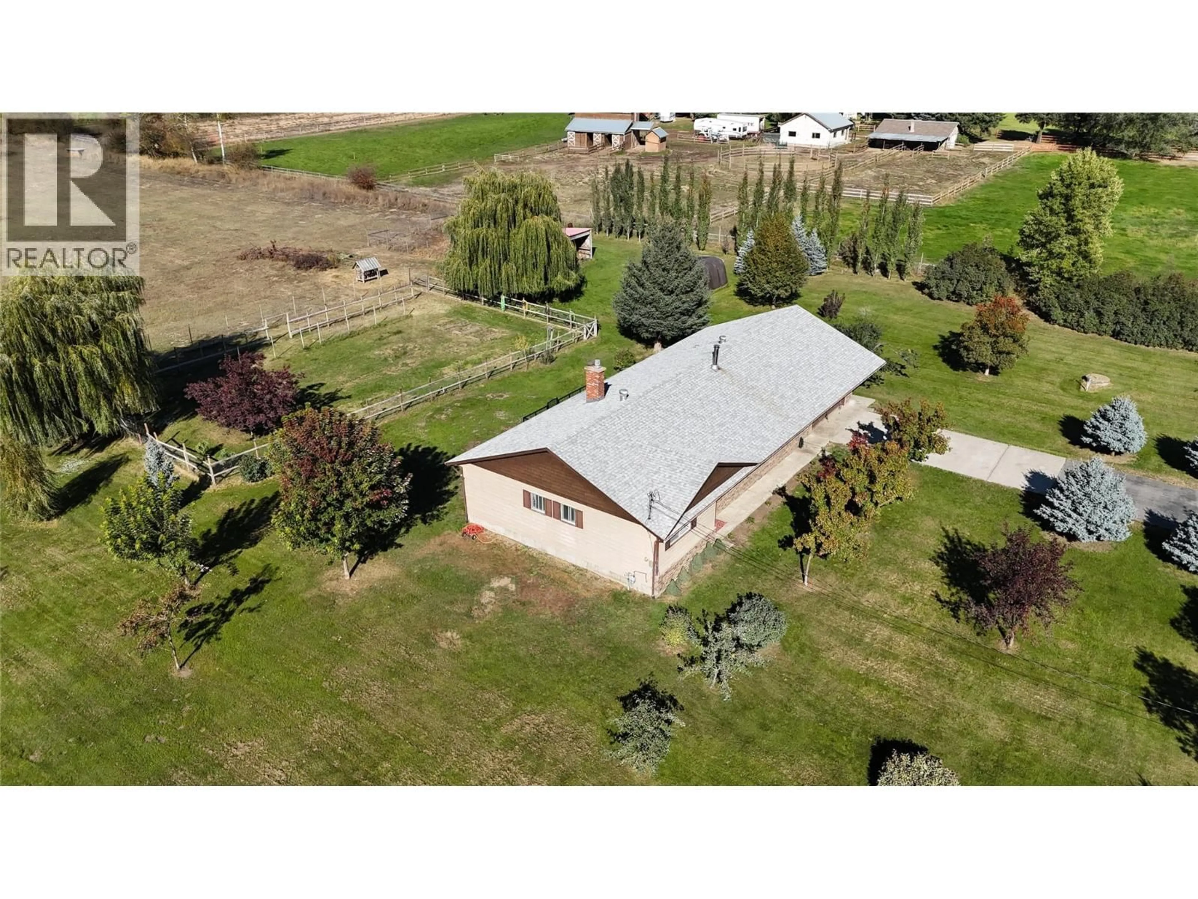 A pic from outside/outdoor area/front of a property/back of a property/a pic from drone, building for 5015 SIMINOFF ROAD, Grand Forks British Columbia V0H1H4