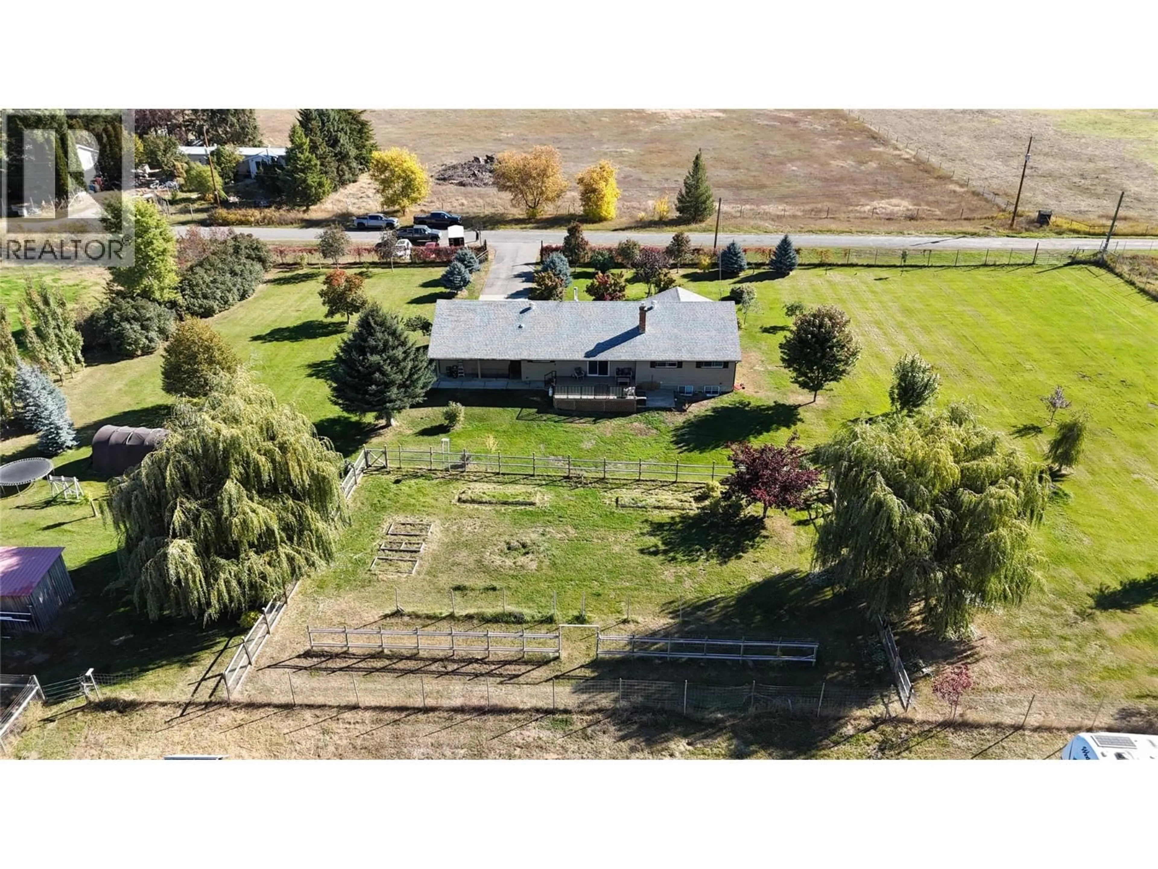 A pic from outside/outdoor area/front of a property/back of a property/a pic from drone, building for 5015 SIMINOFF ROAD, Grand Forks British Columbia V0H1H4