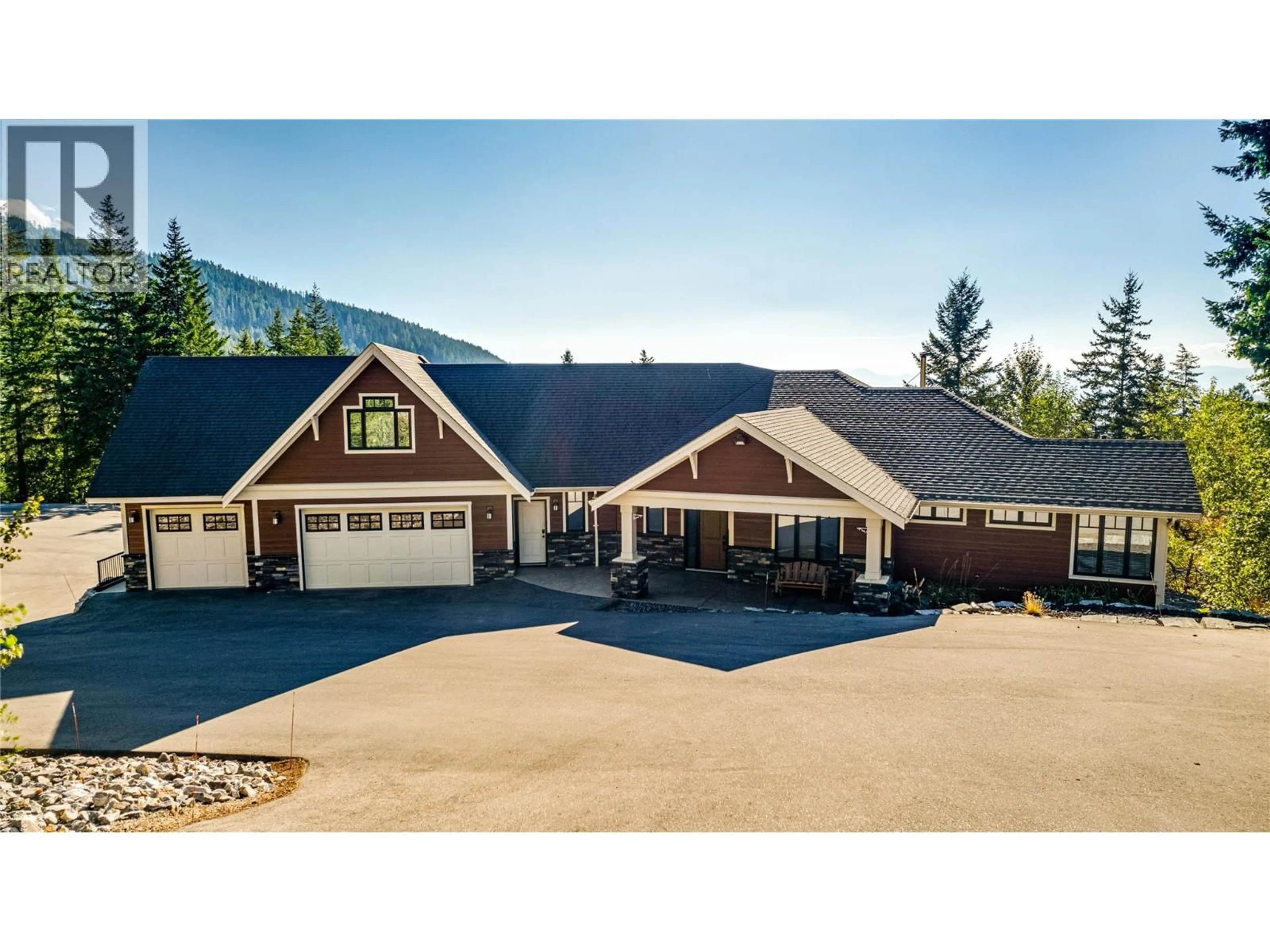 A pic from outside/outdoor area/front of a property/back of a property/a pic from drone, mountain view for 6054 LYNX DRIVE, Vernon British Columbia V1B3J5