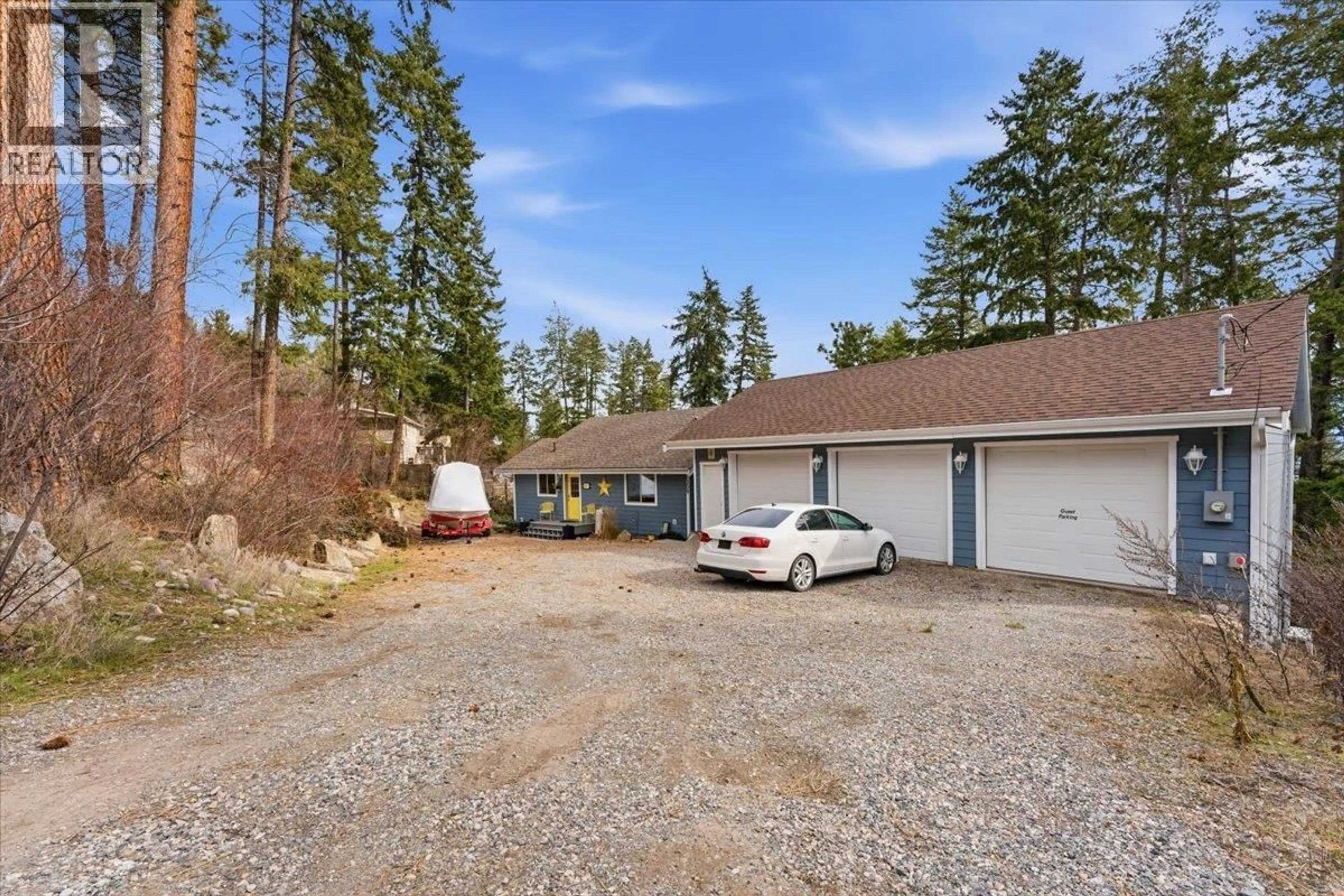 A pic from outside/outdoor area/front of a property/back of a property/a pic from drone, street for 309 KILLARNEY WAY, Vernon British Columbia V1H2C5