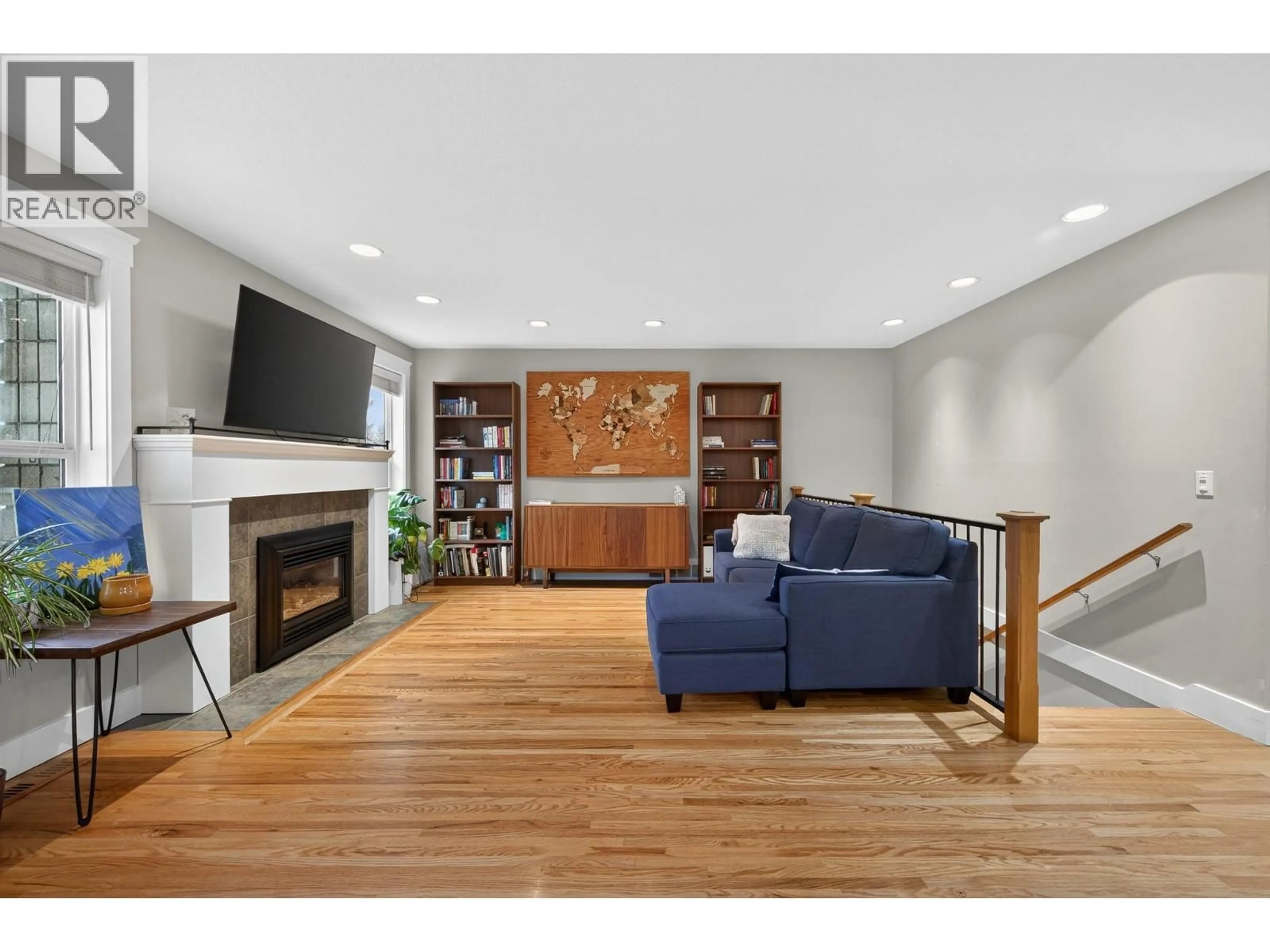 Living room with furniture, wood/laminate floor for 2035 MONTEITH DRIVE, Kamloops British Columbia V2E2G5