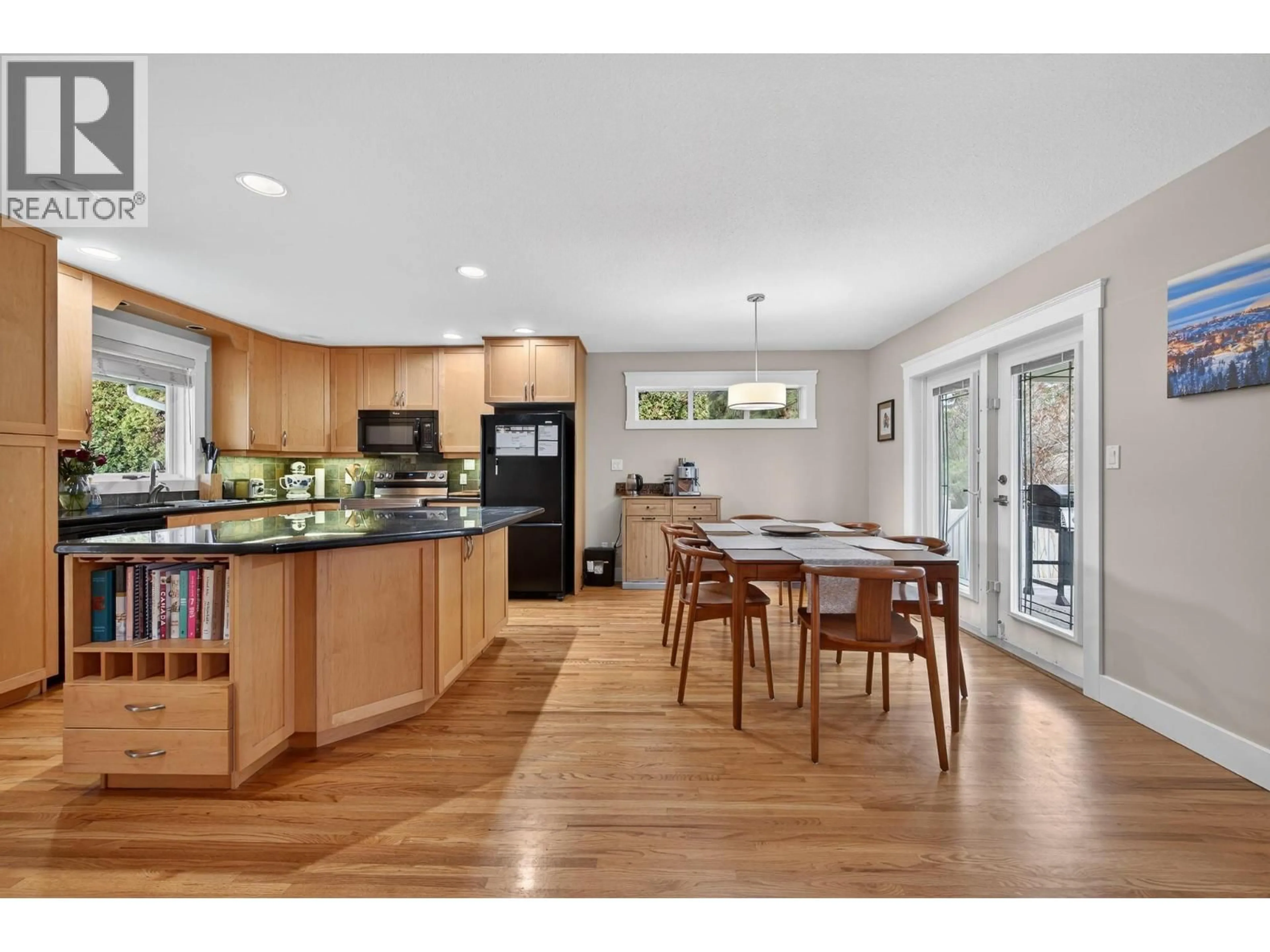 Open concept kitchen, wood/laminate floor for 2035 MONTEITH DRIVE, Kamloops British Columbia V2E2G5