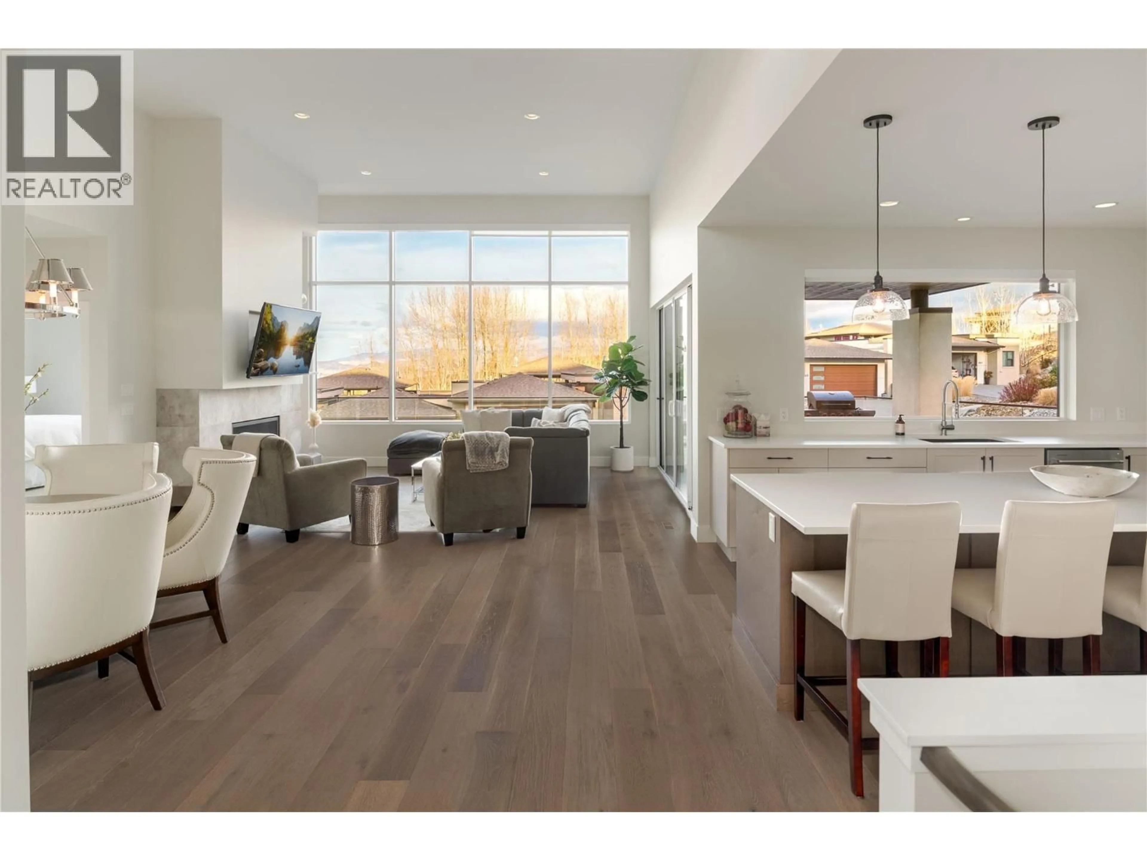Open concept kitchen, wood/laminate floor for 456 SPARROW HAWK COURT, Kelowna British Columbia V1W0A6