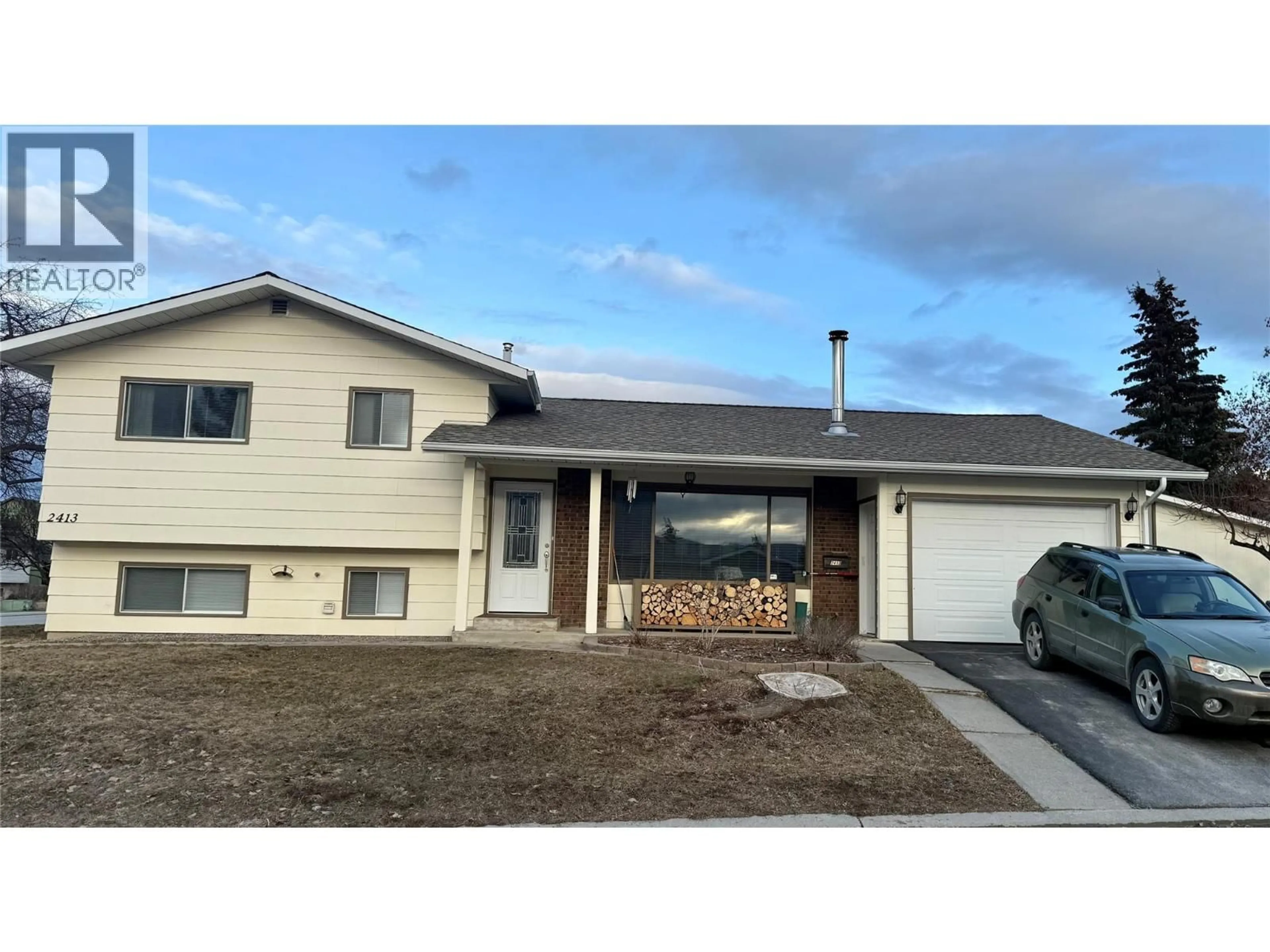 Home with vinyl exterior material, street for 2413 4TH STREET SOUTH, Cranbrook British Columbia V1C5C5