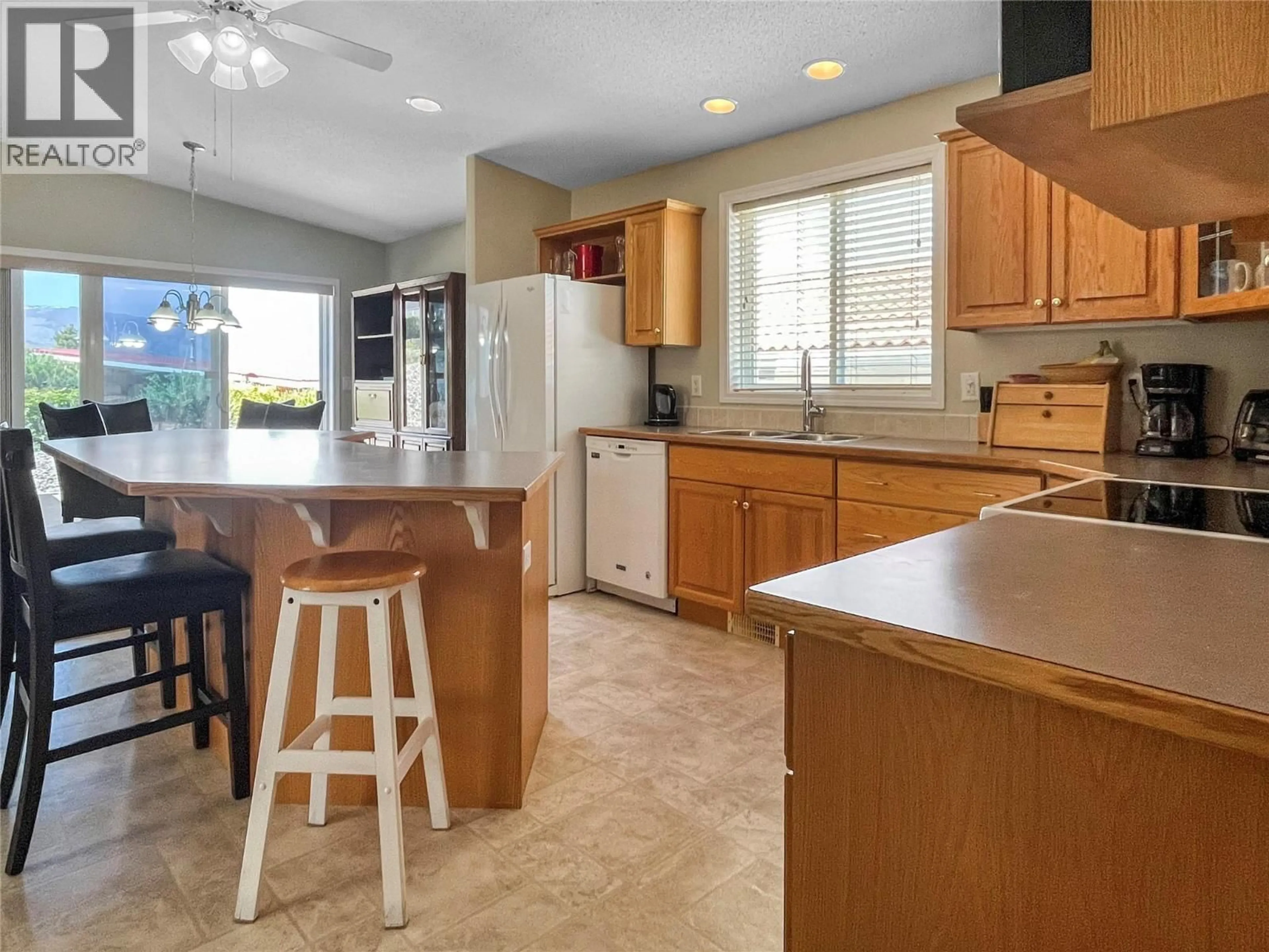 Open concept kitchen, ceramic/tile floor for 52 - 9400 115TH STREET, Osoyoos British Columbia V0H1V5