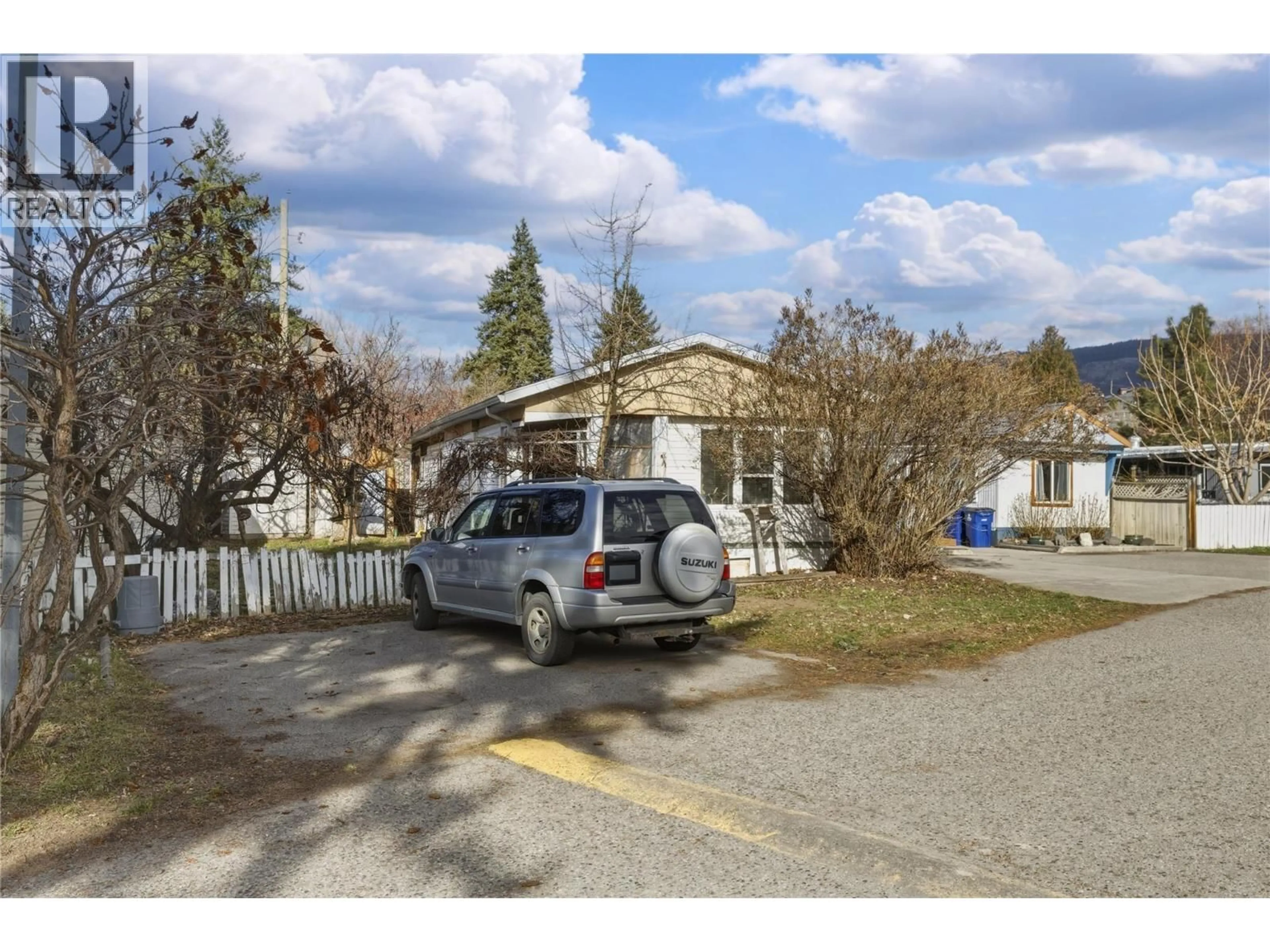 A pic from outside/outdoor area/front of a property/back of a property/a pic from drone, street for 32 - 2035 BOUCHERIE ROAD, Westbank British Columbia V4T1Z6